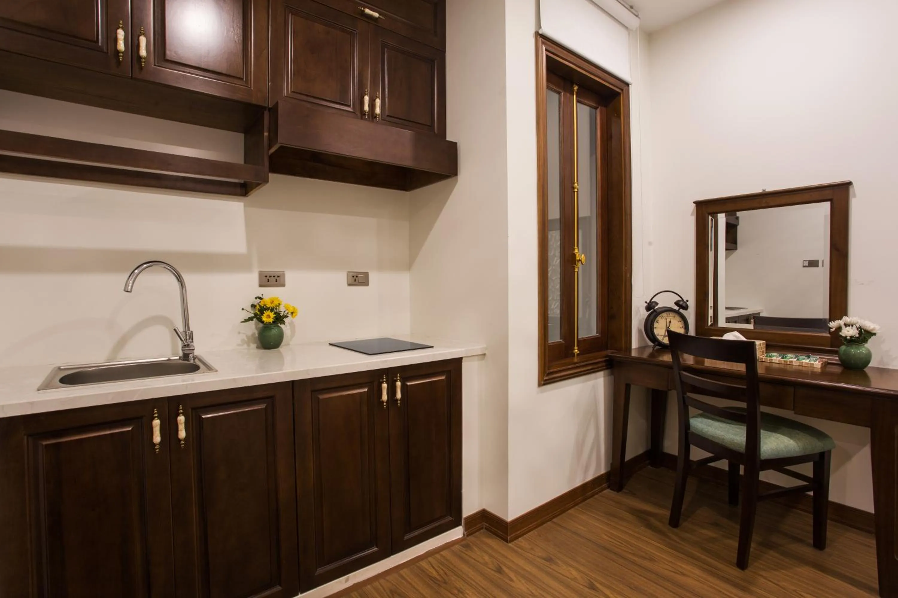 Kitchen or kitchenette in Maro Hotel