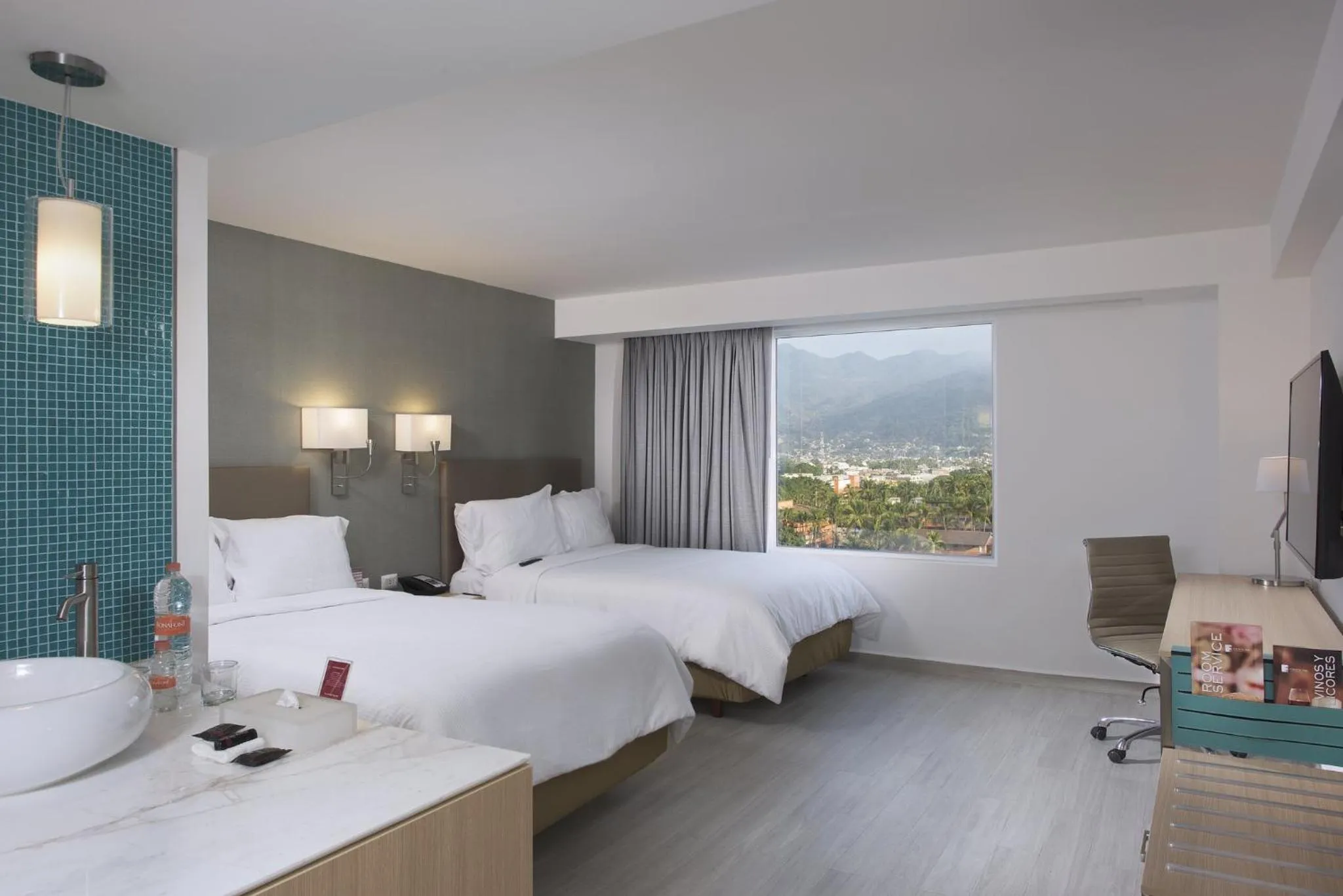 Photo of the whole room, Bed in Fiesta Inn Puerto Vallarta Isla