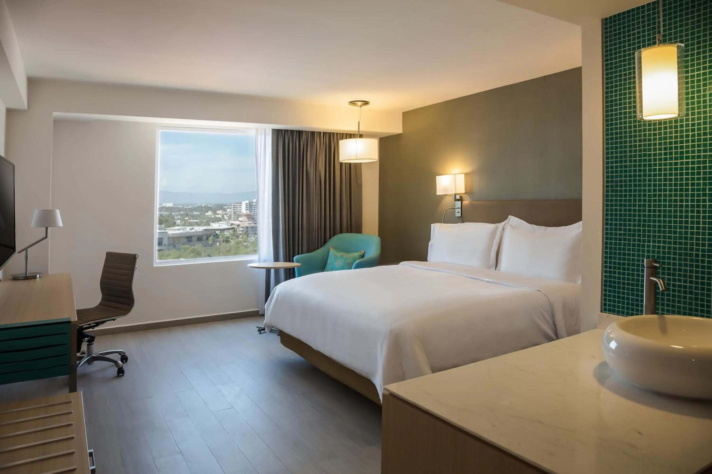 Photo of the whole room, Bed in Fiesta Inn Puerto Vallarta Isla