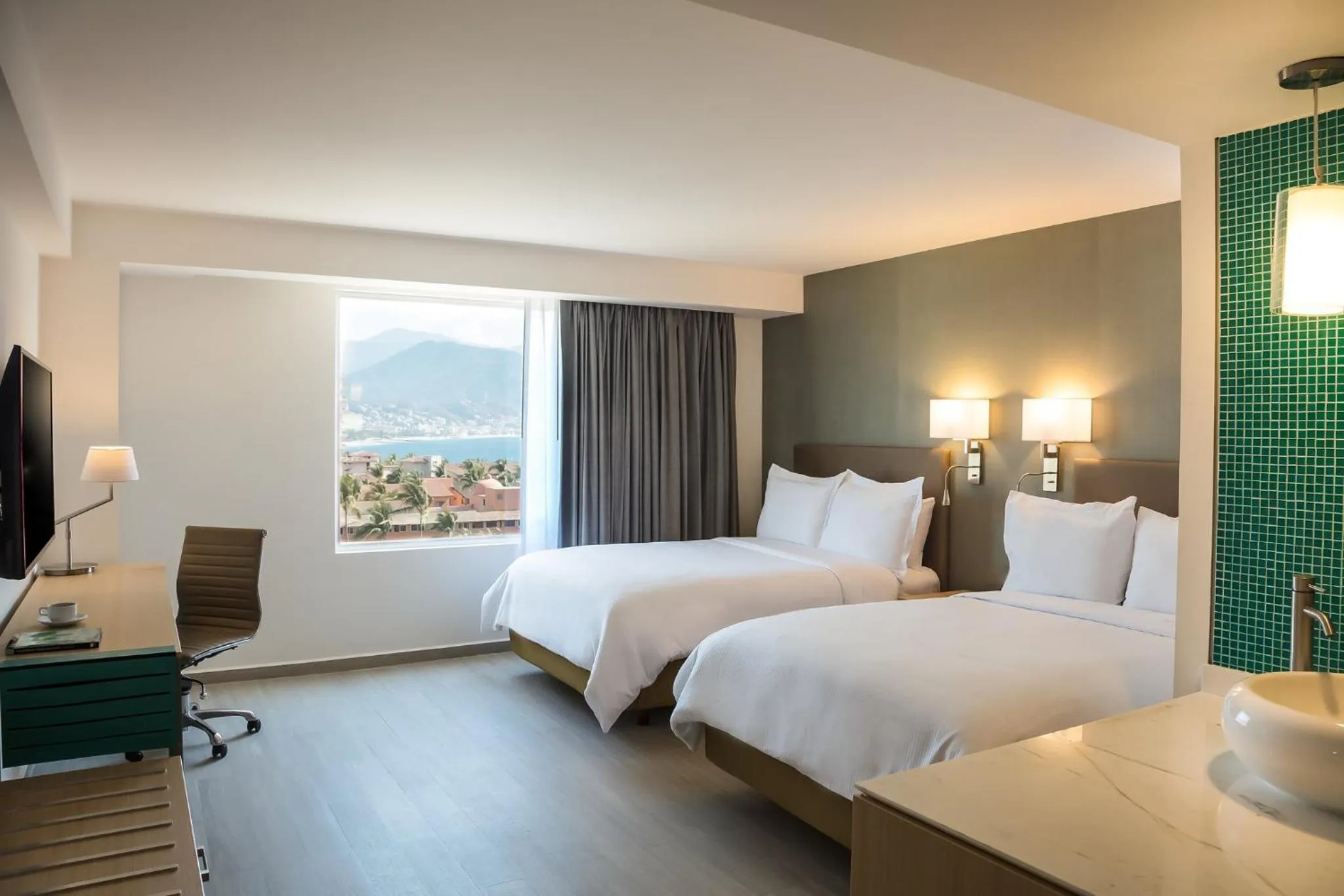 Photo of the whole room, Bed in Fiesta Inn Puerto Vallarta Isla