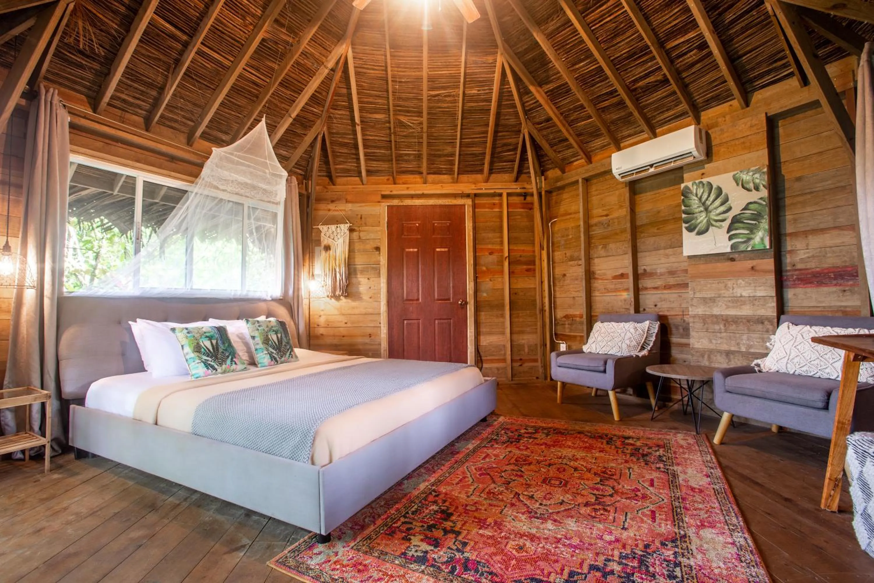 Seating area, Bed in Selina Red Frog