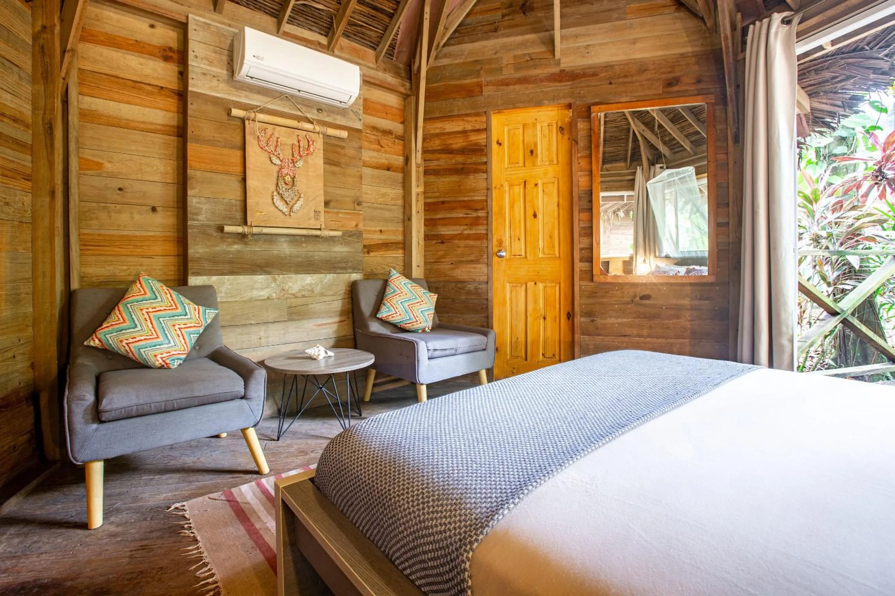 Seating area, Bed in Selina Red Frog