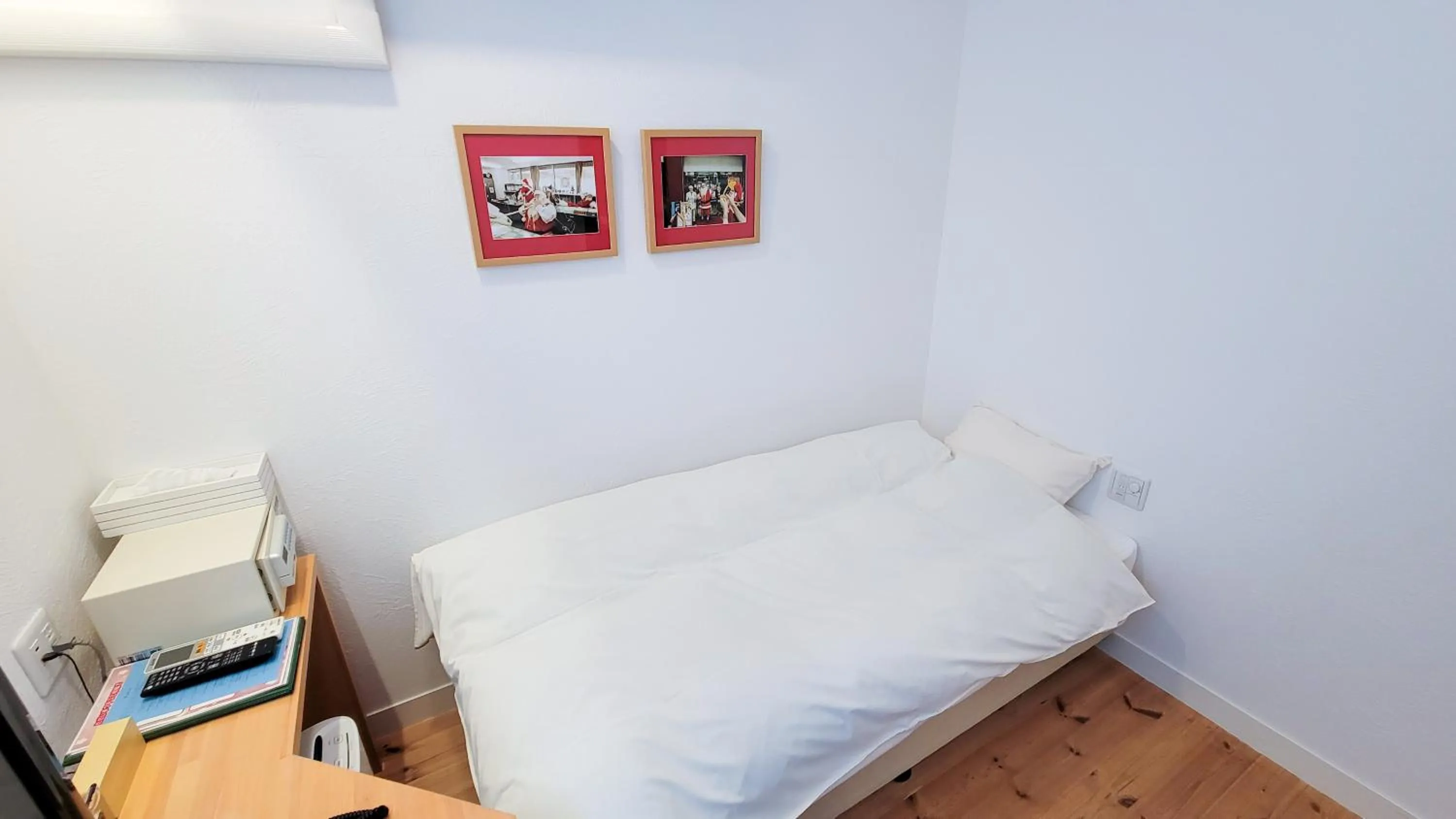 Bed in Amakusa Santacoming Hotel