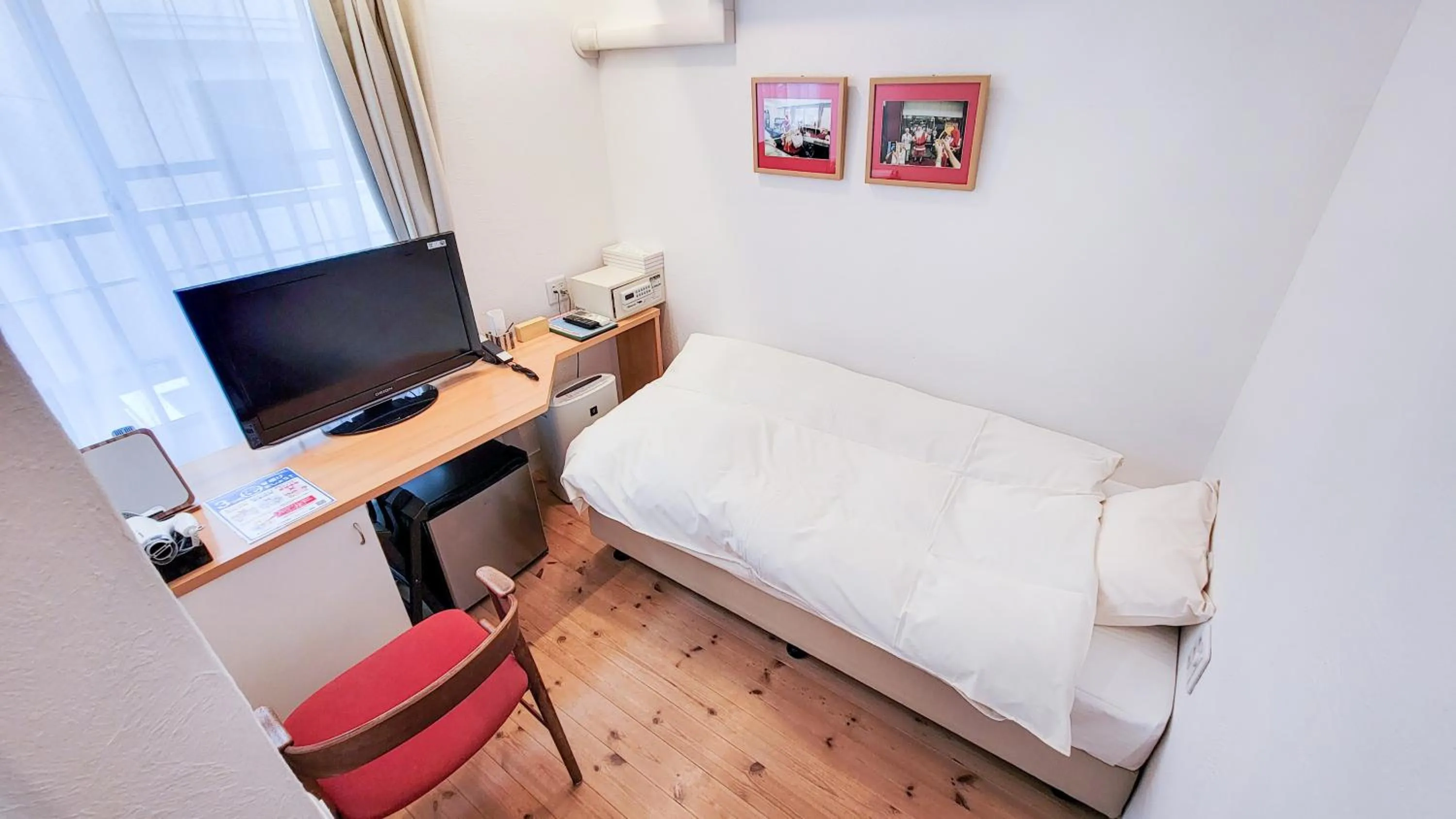 Bed in Amakusa Santacoming Hotel