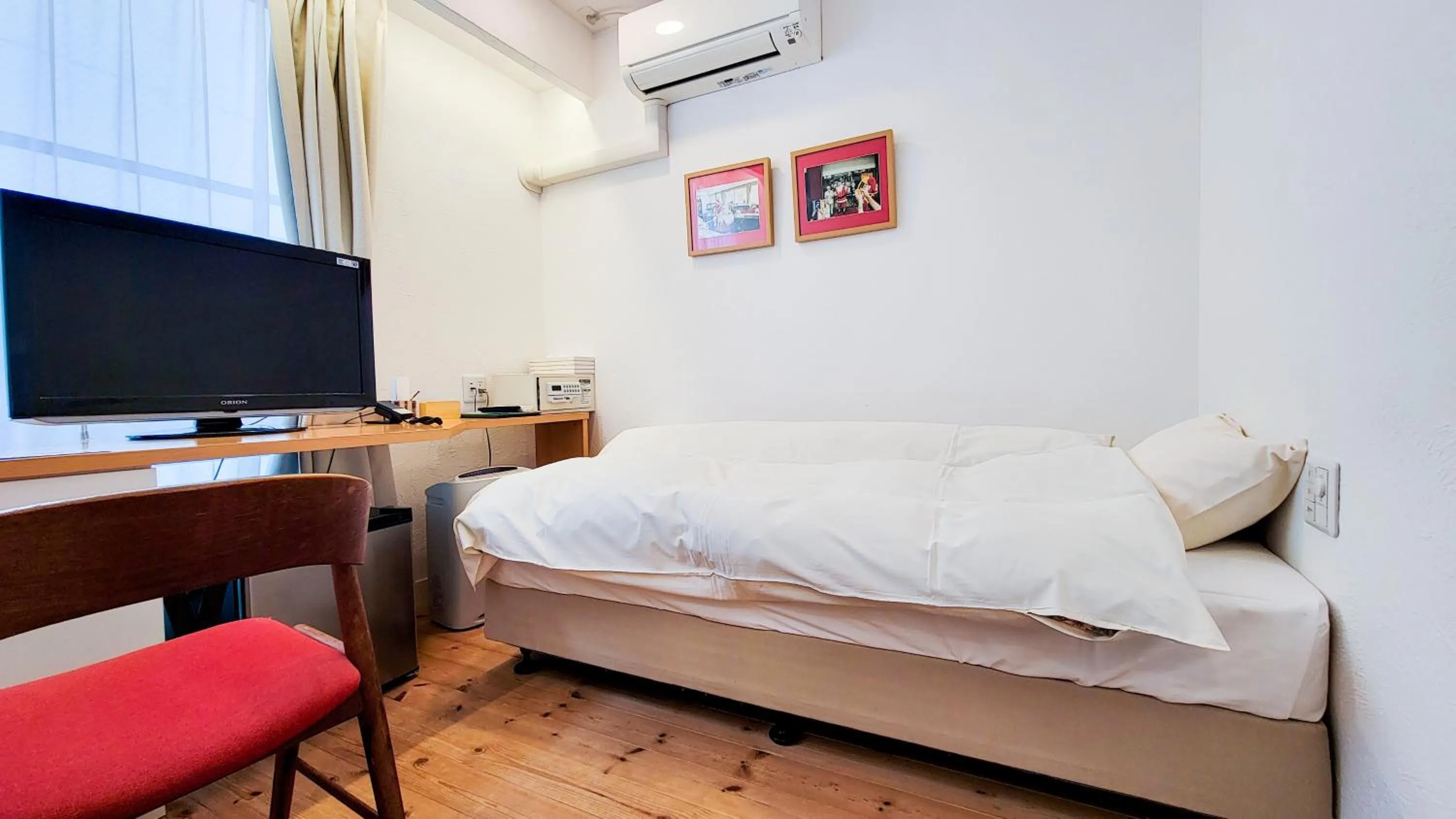 Bed in Amakusa Santacoming Hotel