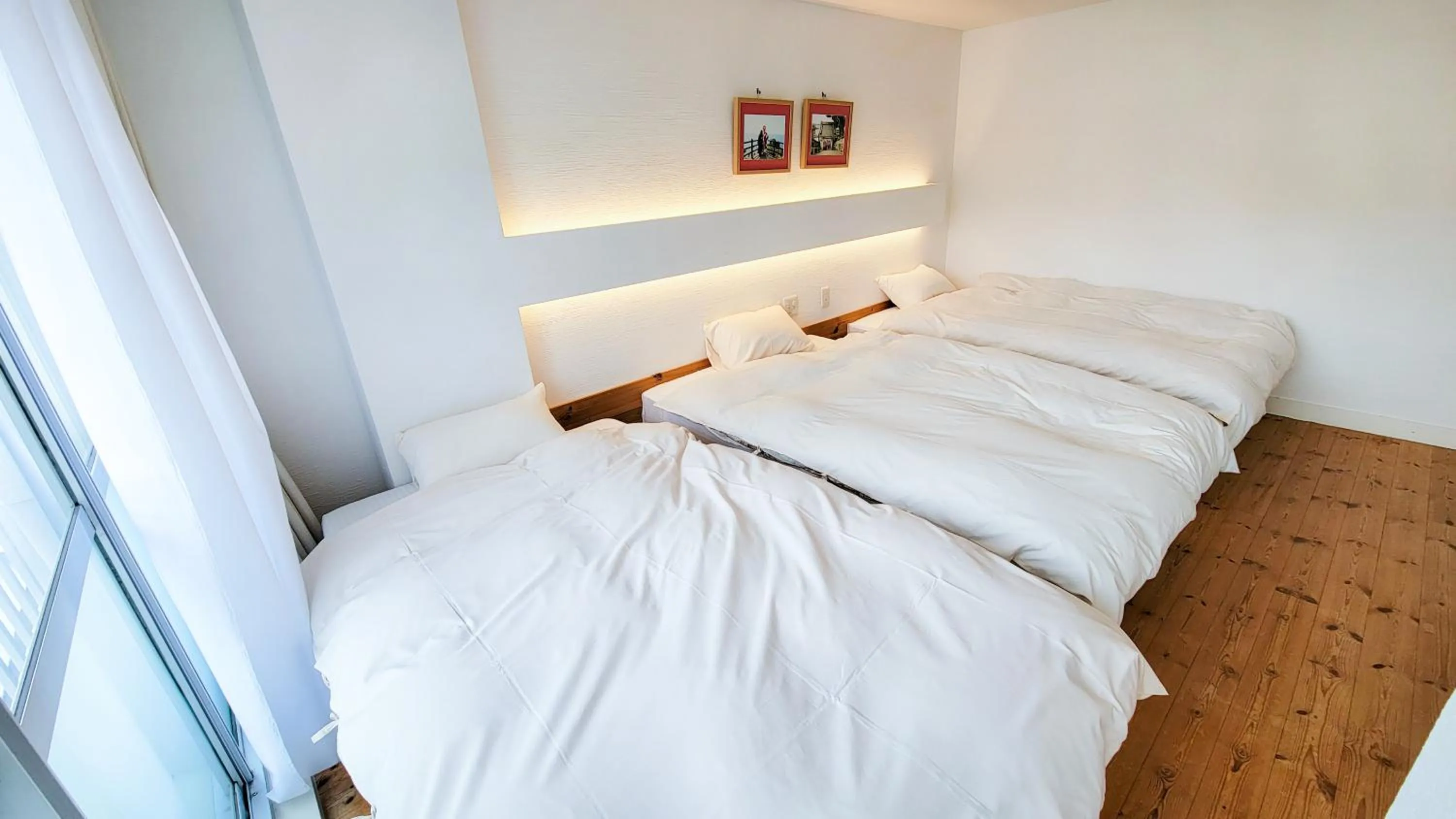 Bed in Amakusa Santacoming Hotel