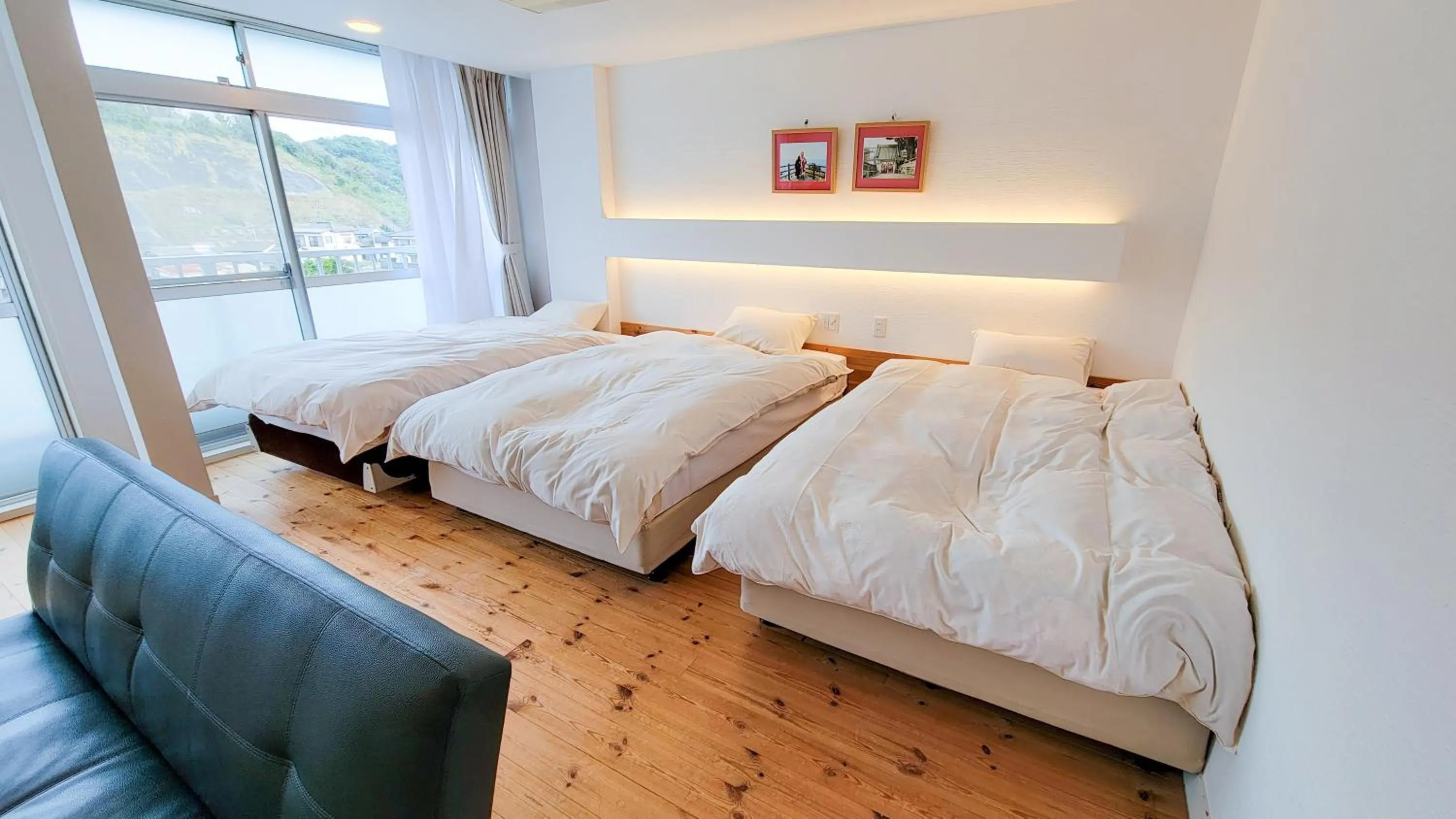 Bed in Amakusa Santacoming Hotel