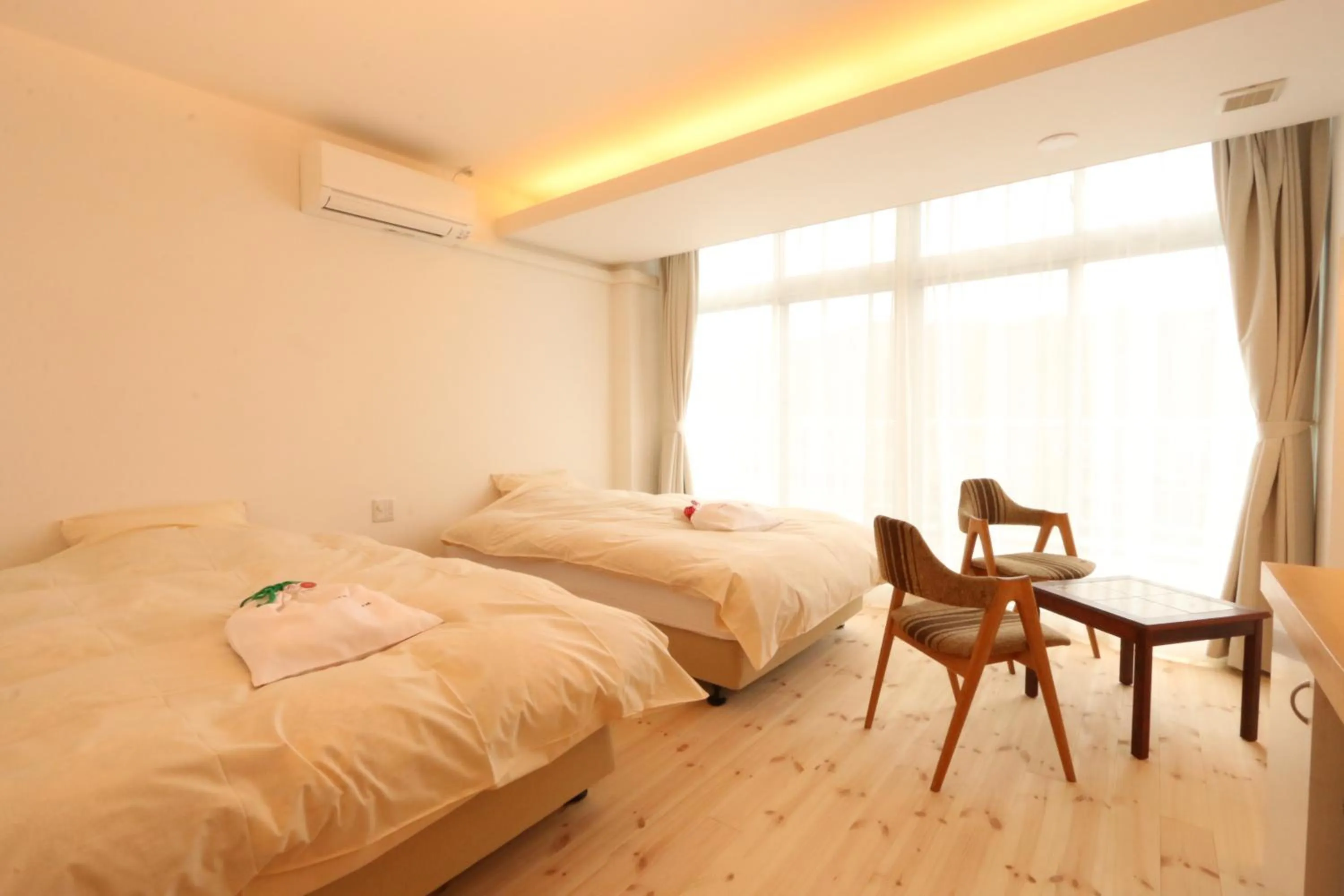 Bed in Amakusa Santacoming Hotel