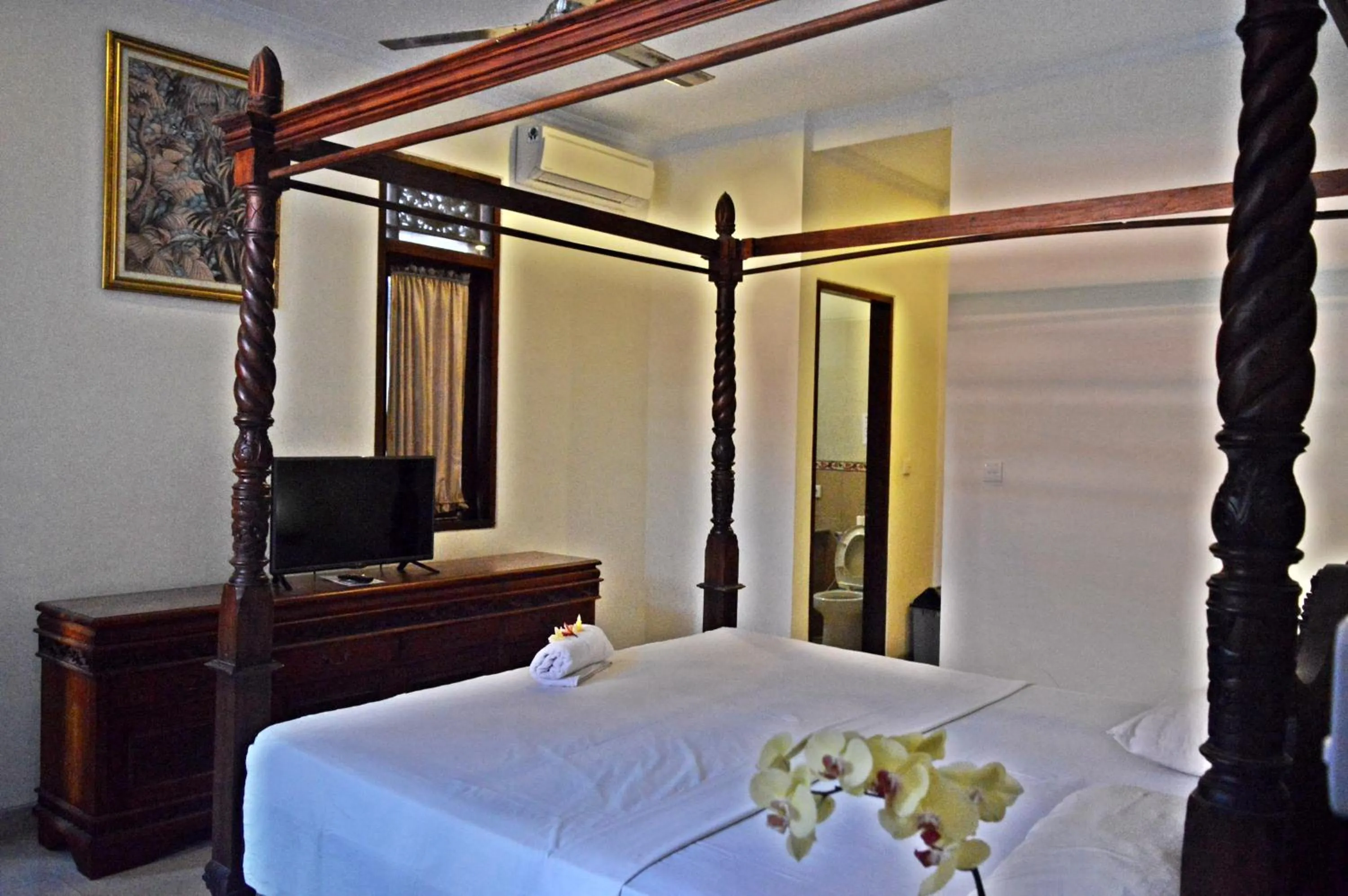 Bed in Yulia 2 Homestay Sanur