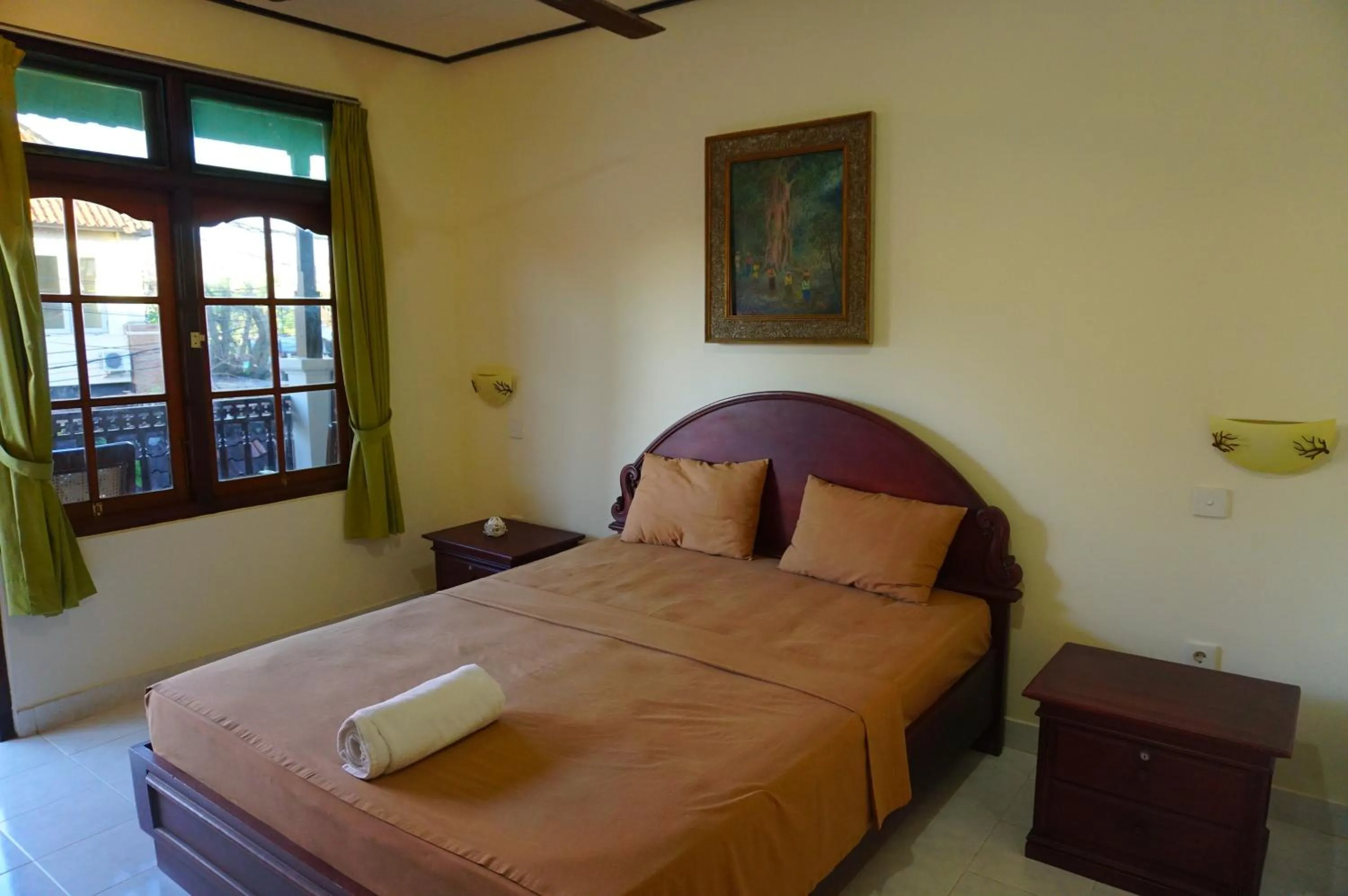 Bed in Yulia 2 Homestay Sanur