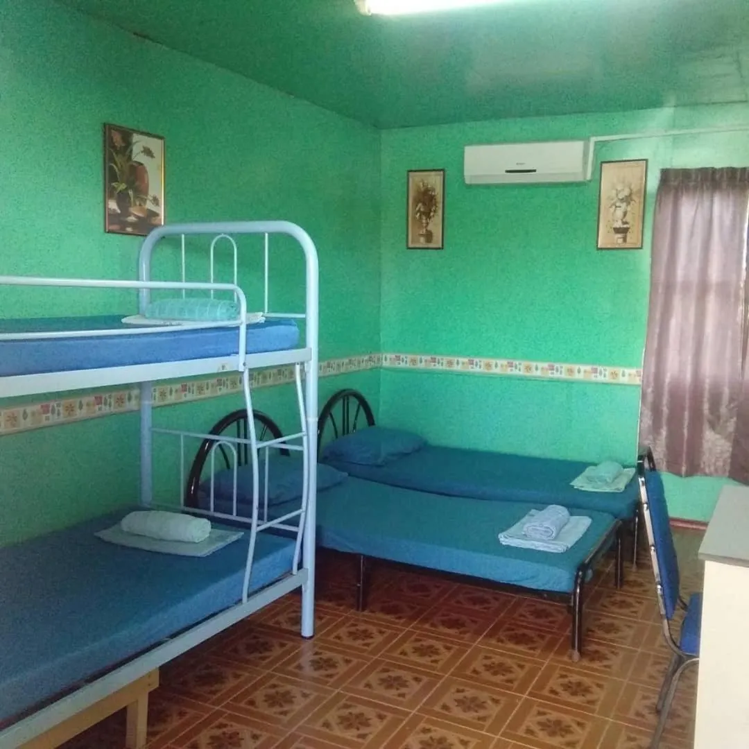 Bed in Taun Gusi Village Homestay