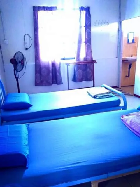 Bed in Taun Gusi Village Homestay