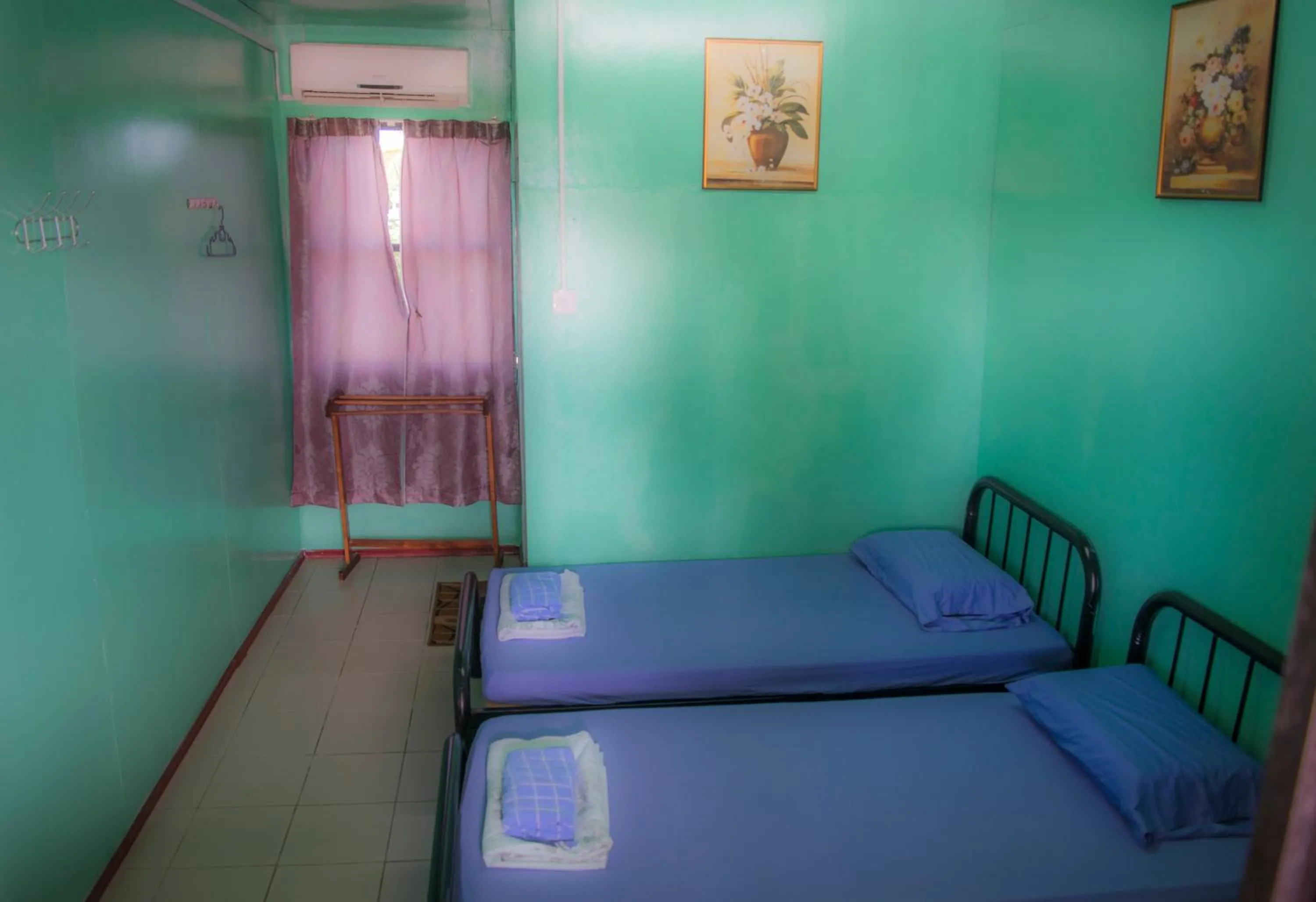 Bed in Taun Gusi Village Homestay