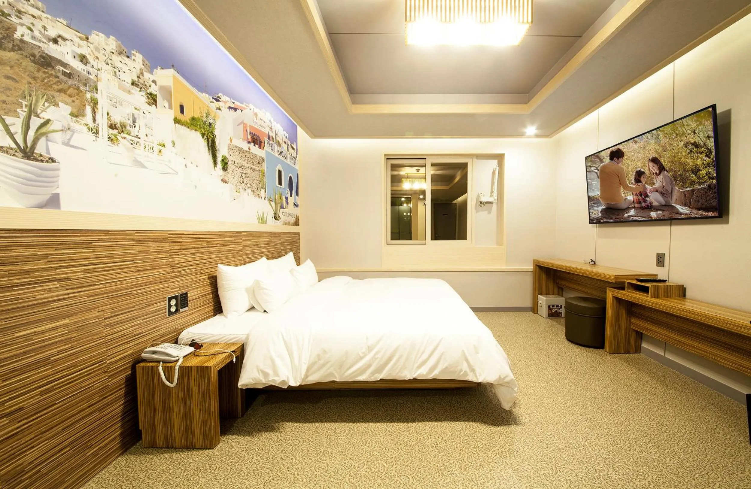 Bed in Jinju Kai Hotel