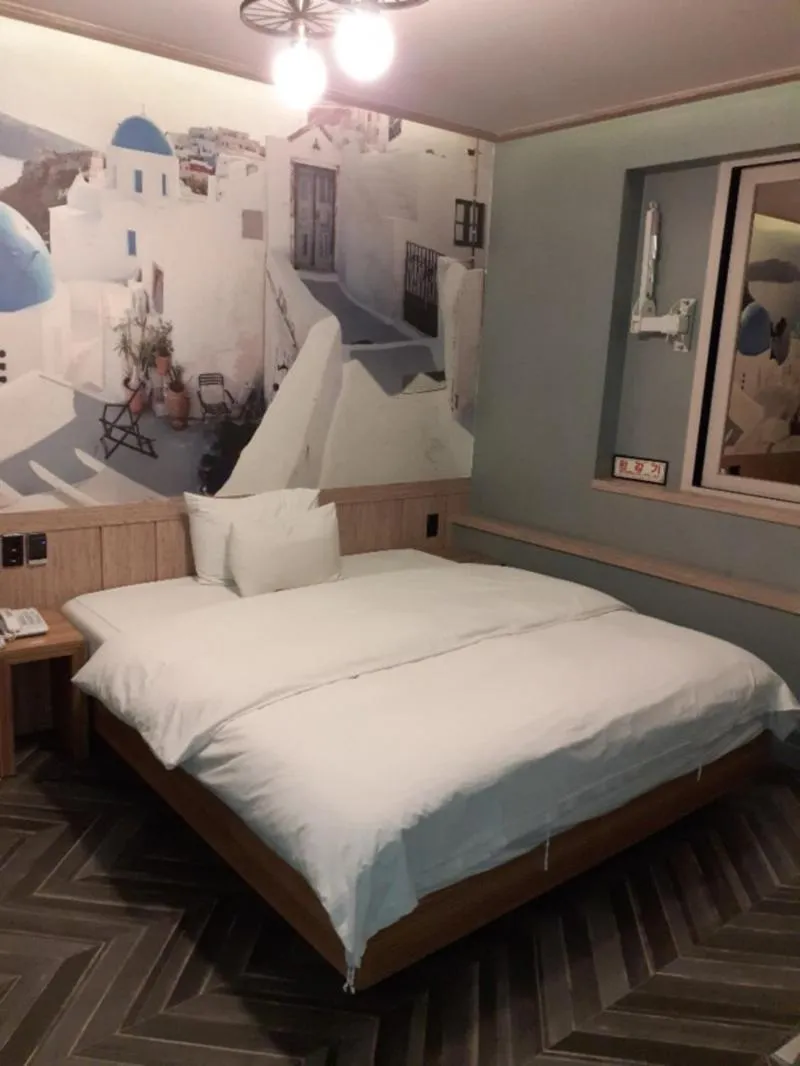 Bed in Jinju Kai Hotel