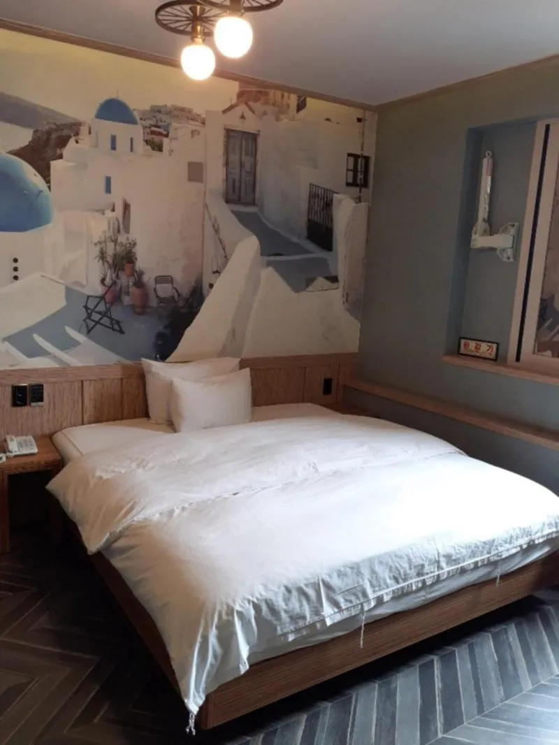 Bed in Jinju Kai Hotel