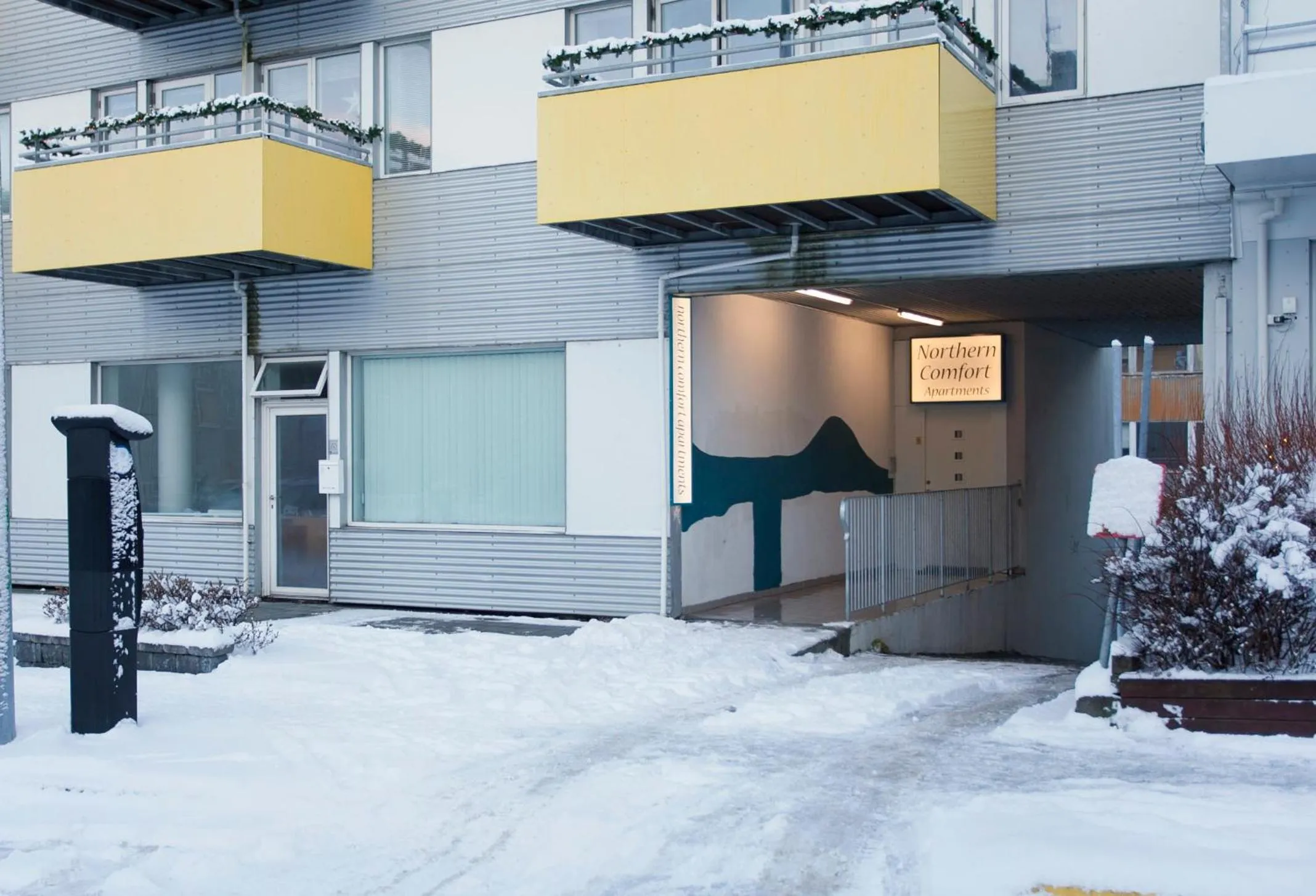 Facade/entrance in Northern Comfort Apartments