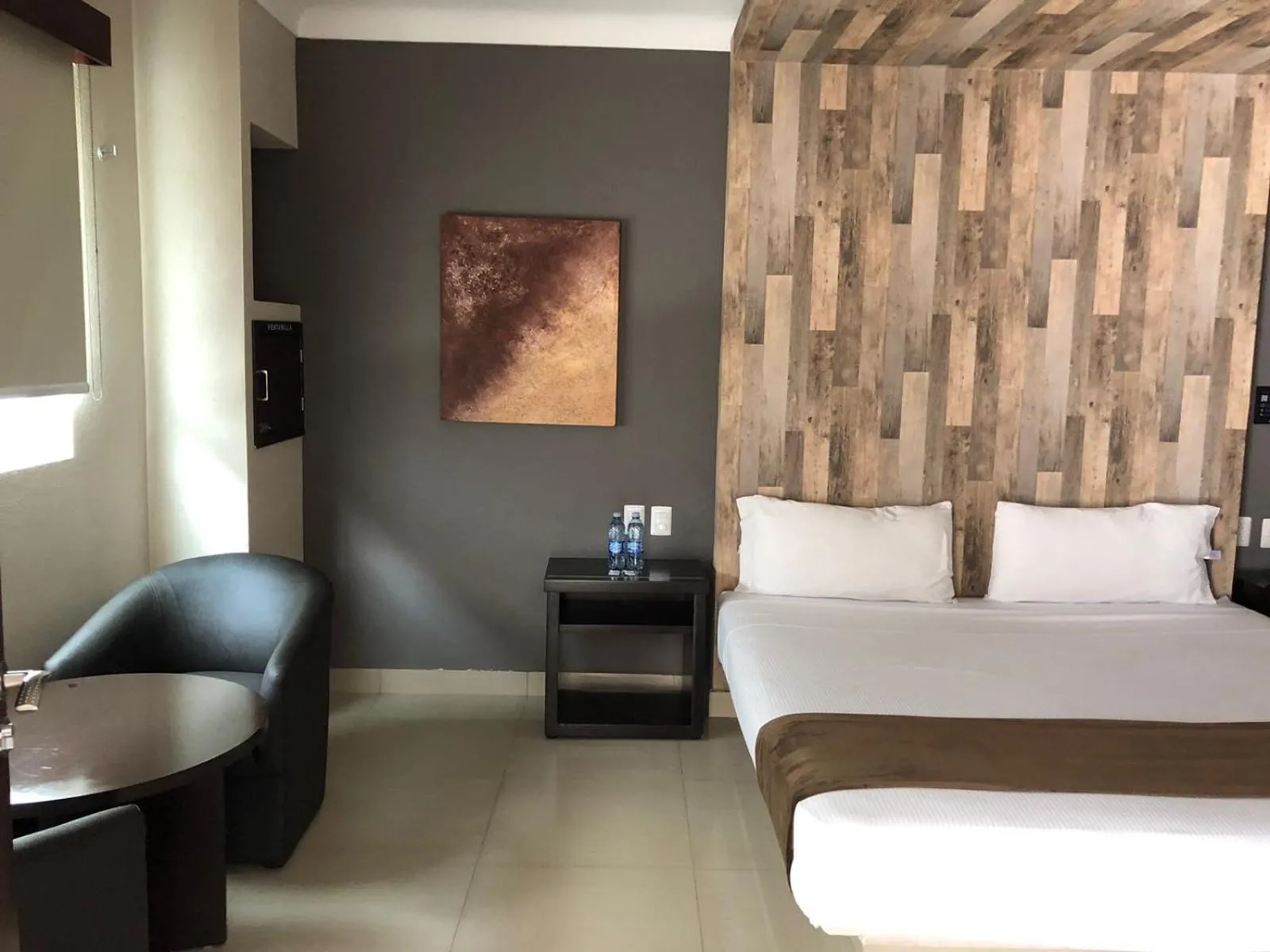 Living room, Bed in Motel Real de Queretaro