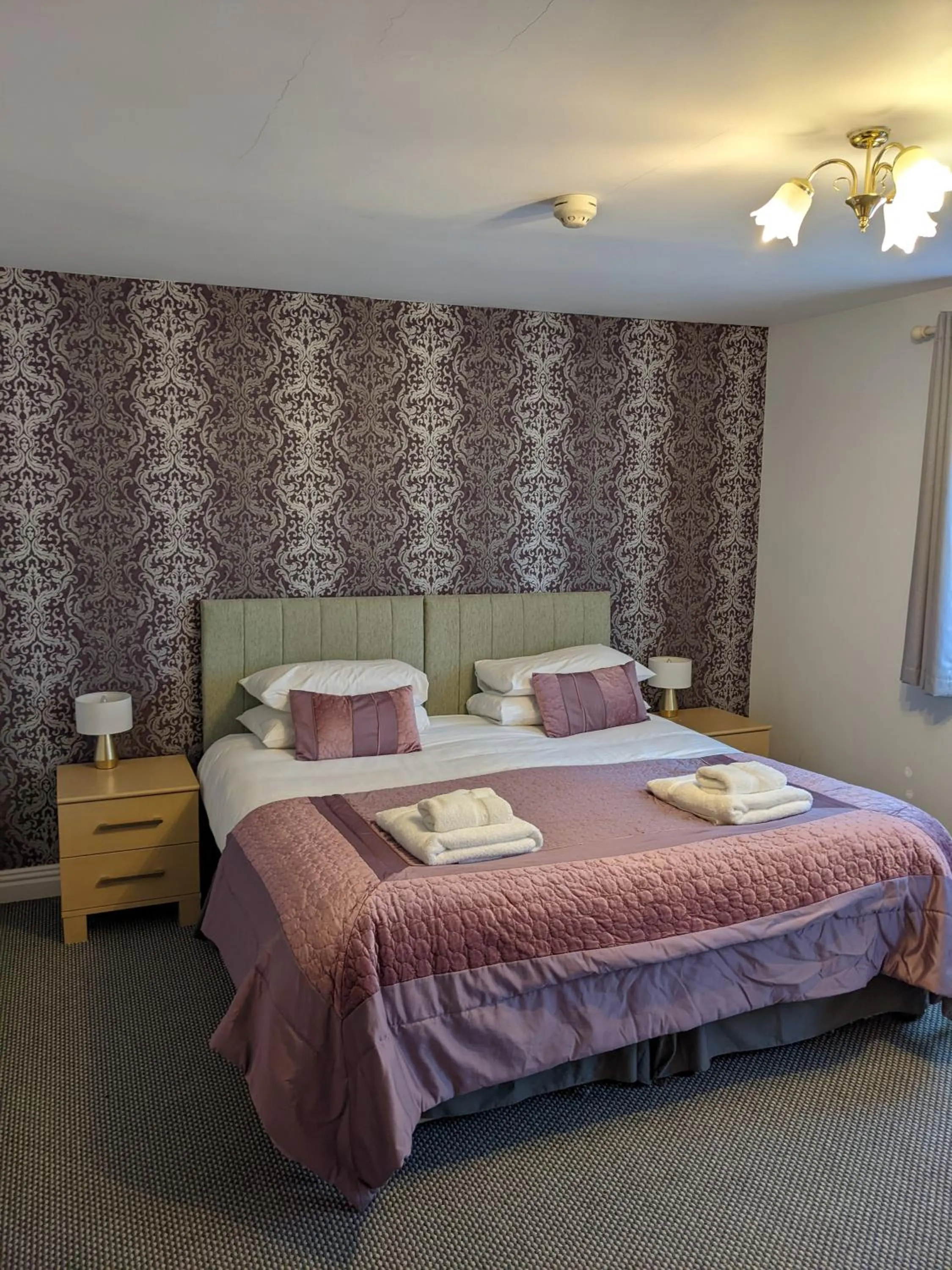 Bed in The Paddocks Hotel