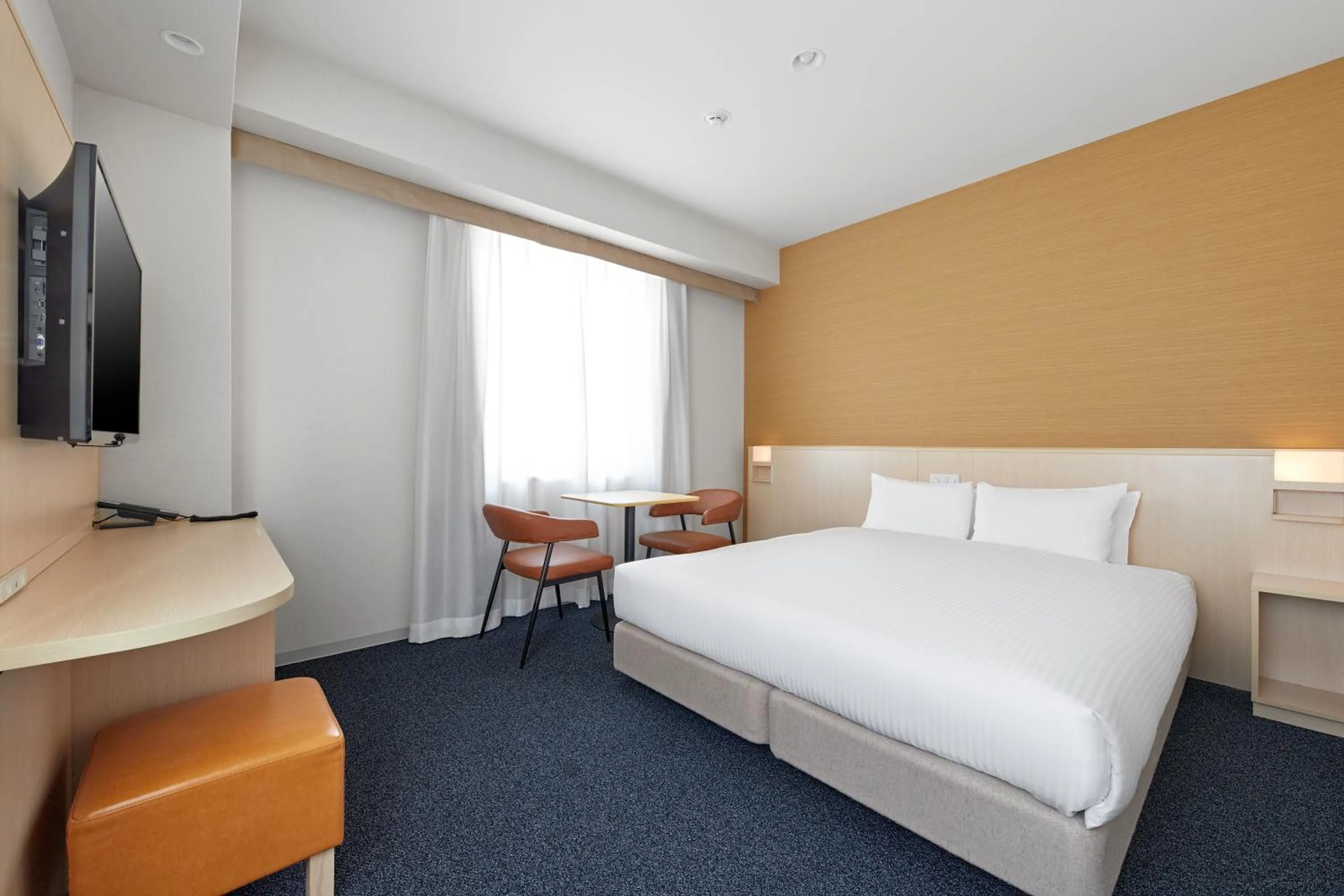 Bed in Sotetsu Fresa Inn Kyoto-Shijokarasuma