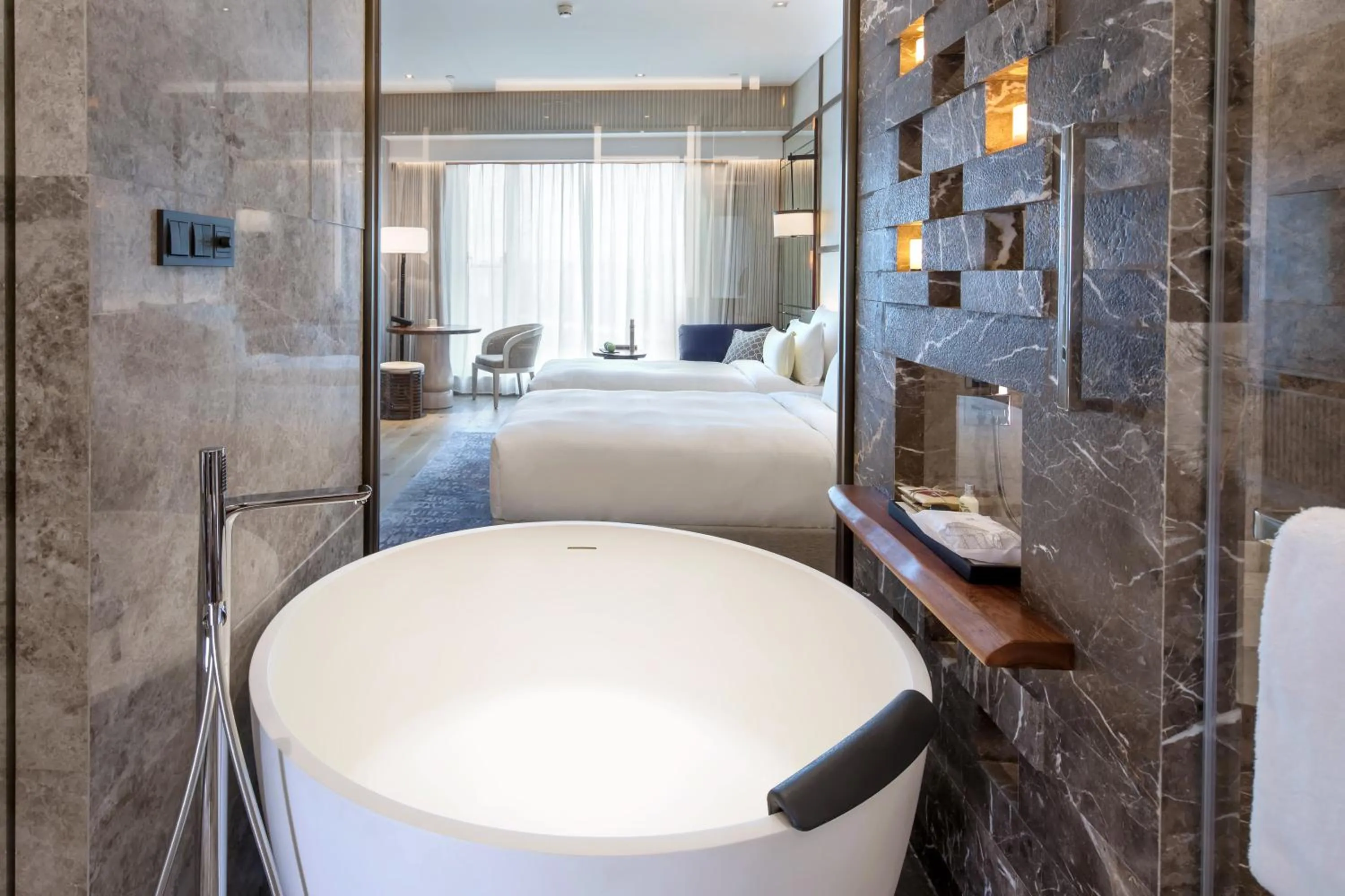 Toilet, Bed in The Anandi Hotel and SPA - Luxury Healing Hotel for Wellbeing
