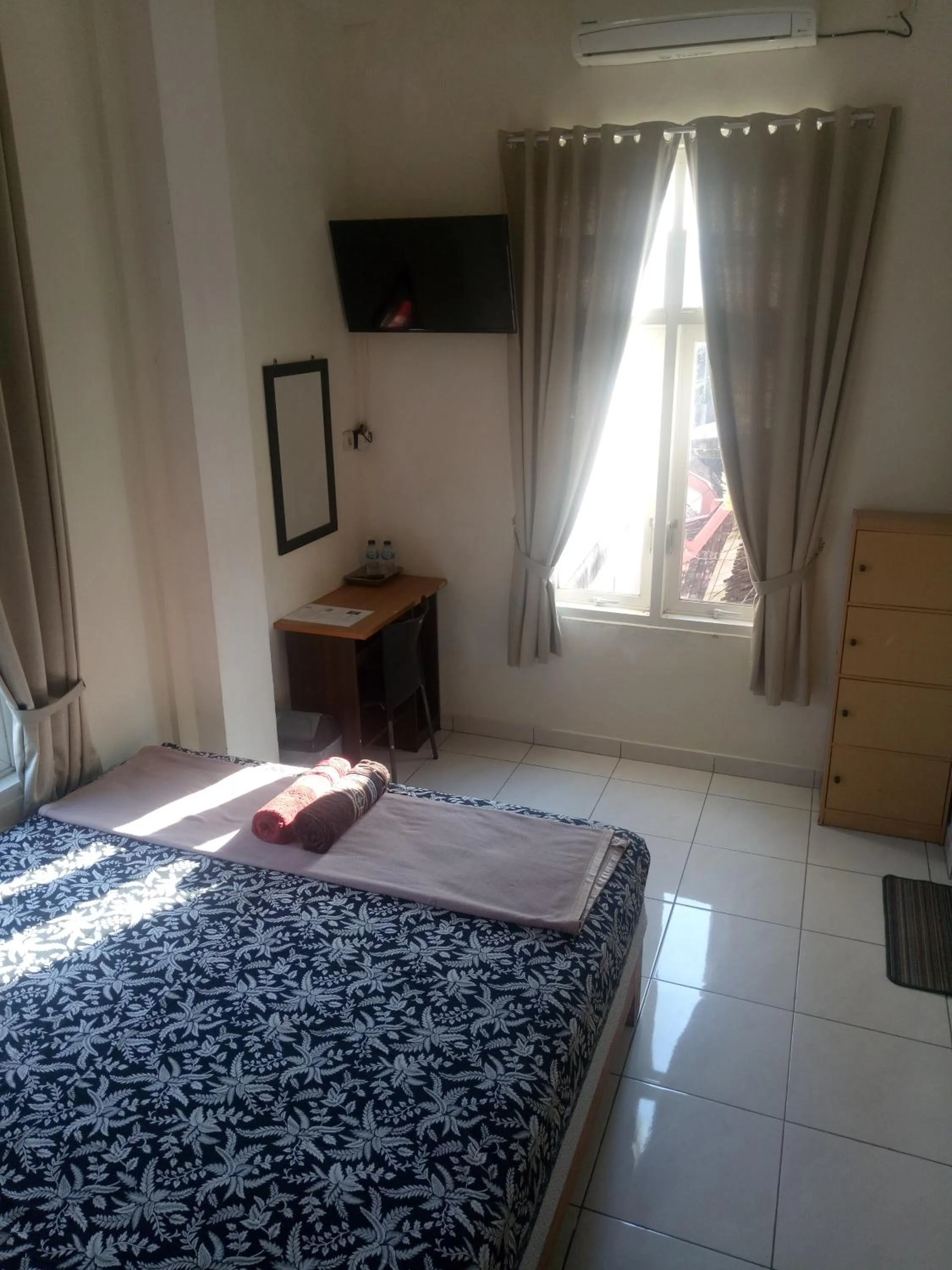 Bed in Losmen Fadel Malioboro Jogja