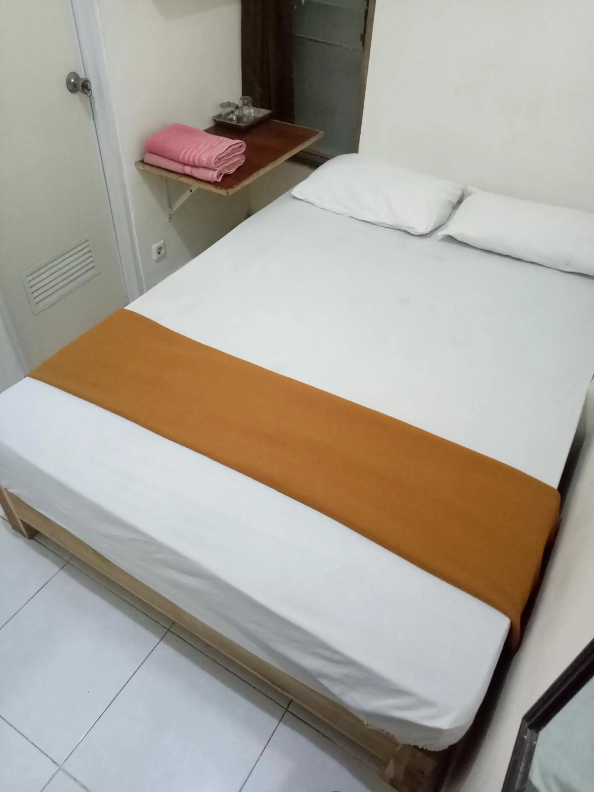 Bed in Losmen Fadel Malioboro Jogja