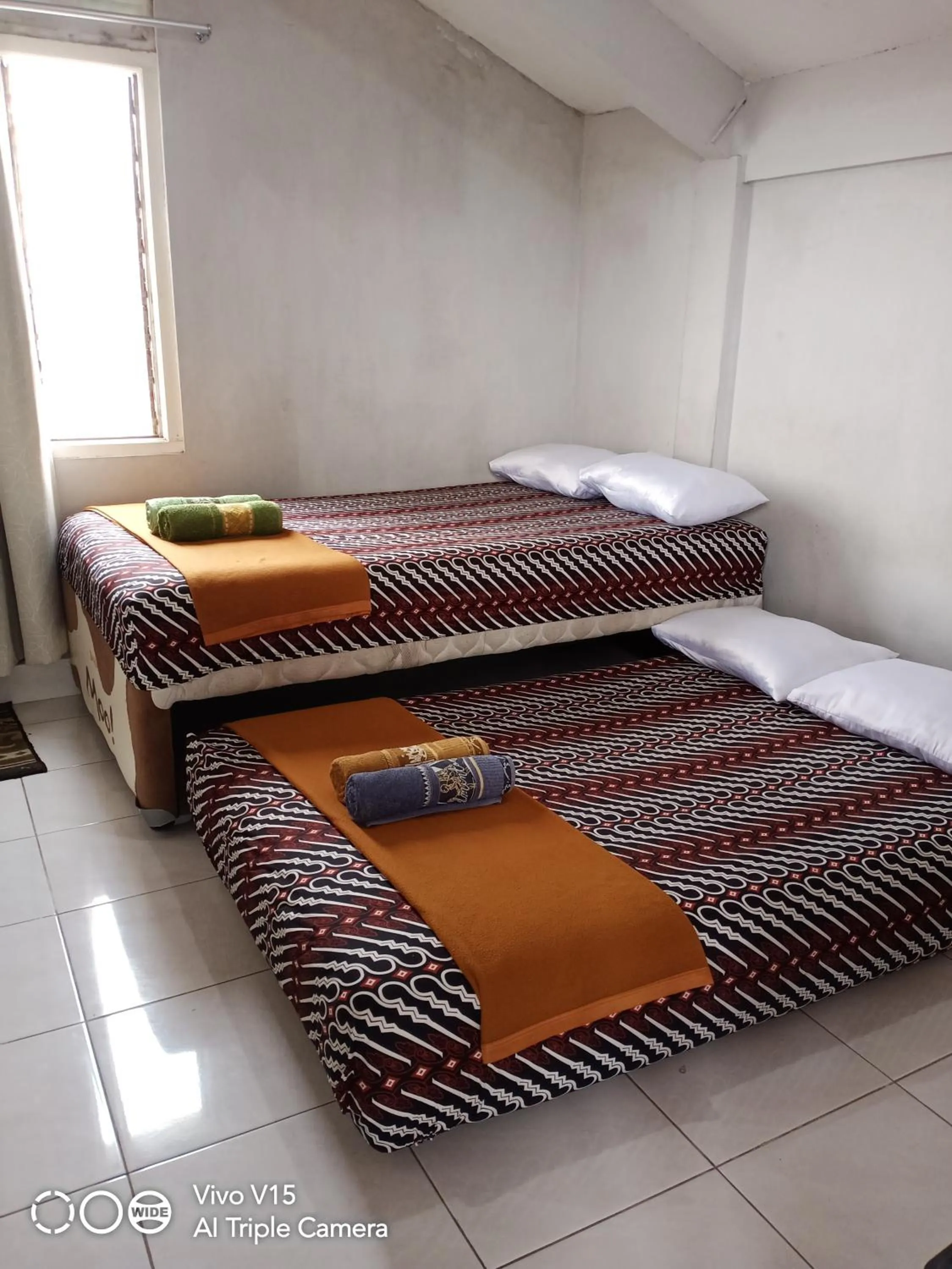 Property building, Bed in Losmen Fadel Malioboro Jogja