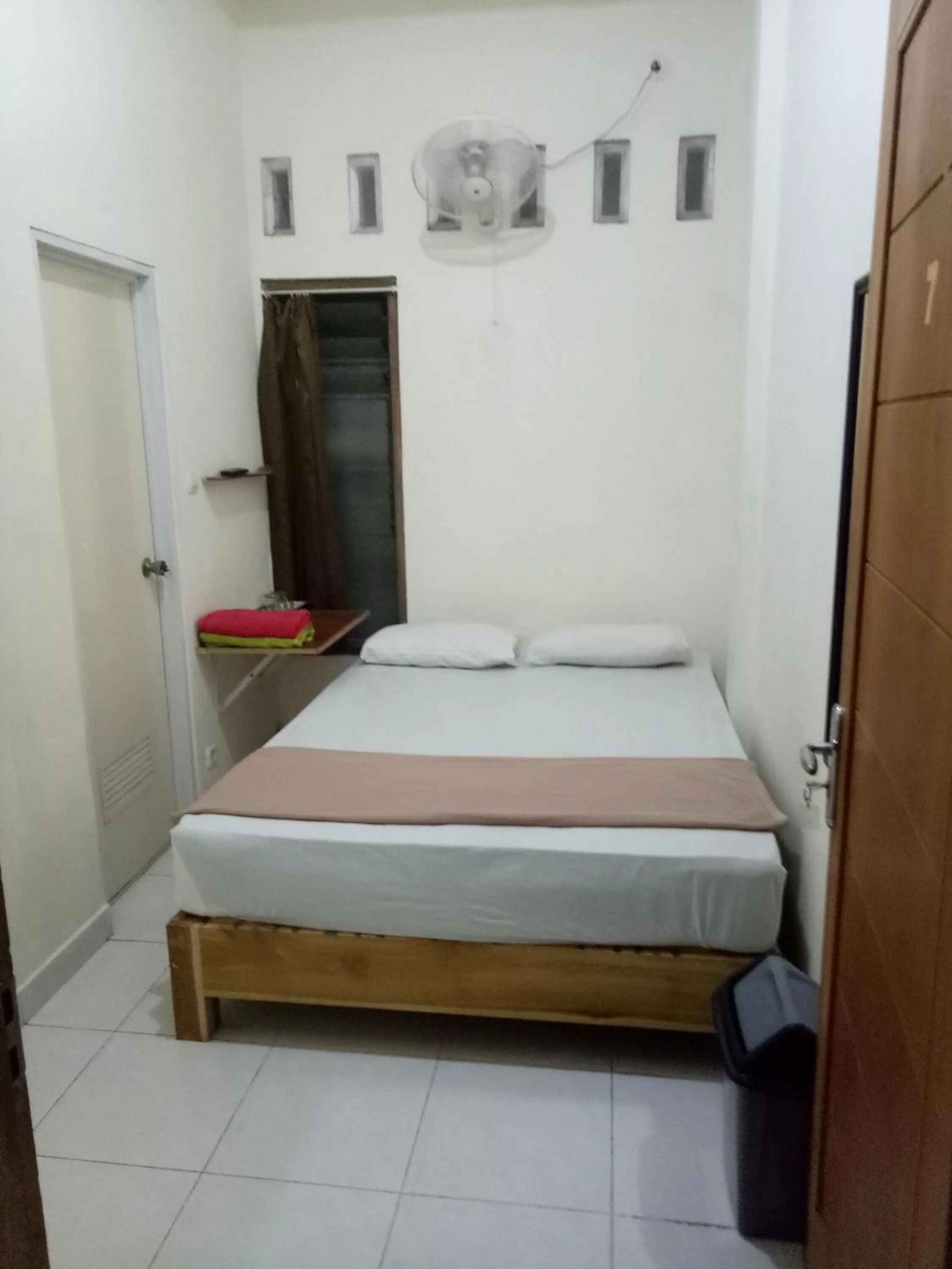 Bed in Losmen Fadel Malioboro Jogja