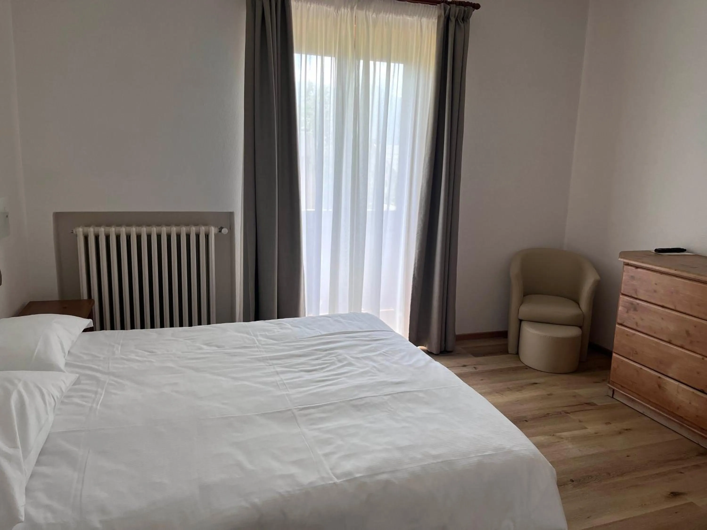 Bed in Hotel Albergo Dolomiti