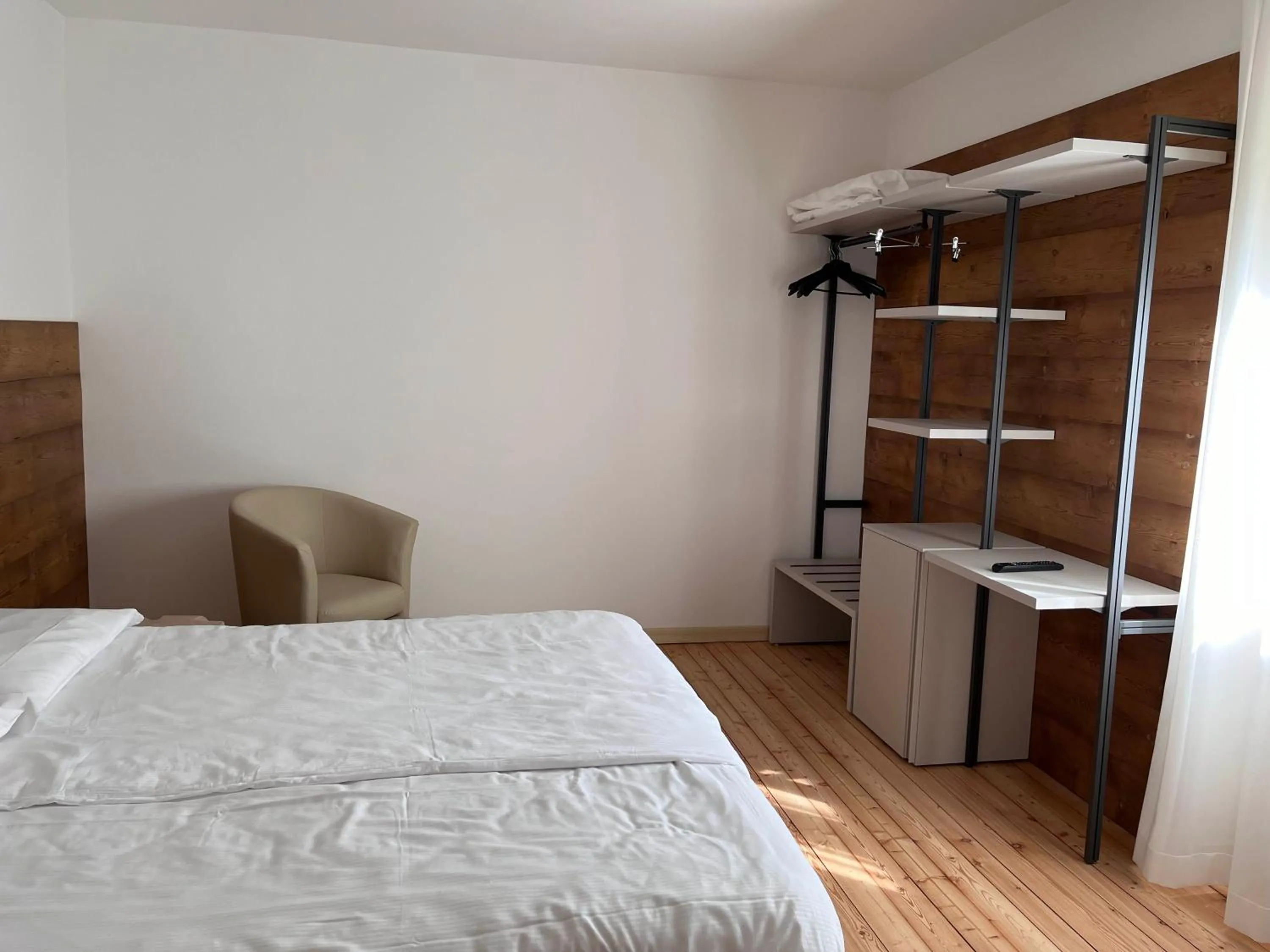 Bed in Hotel Albergo Dolomiti