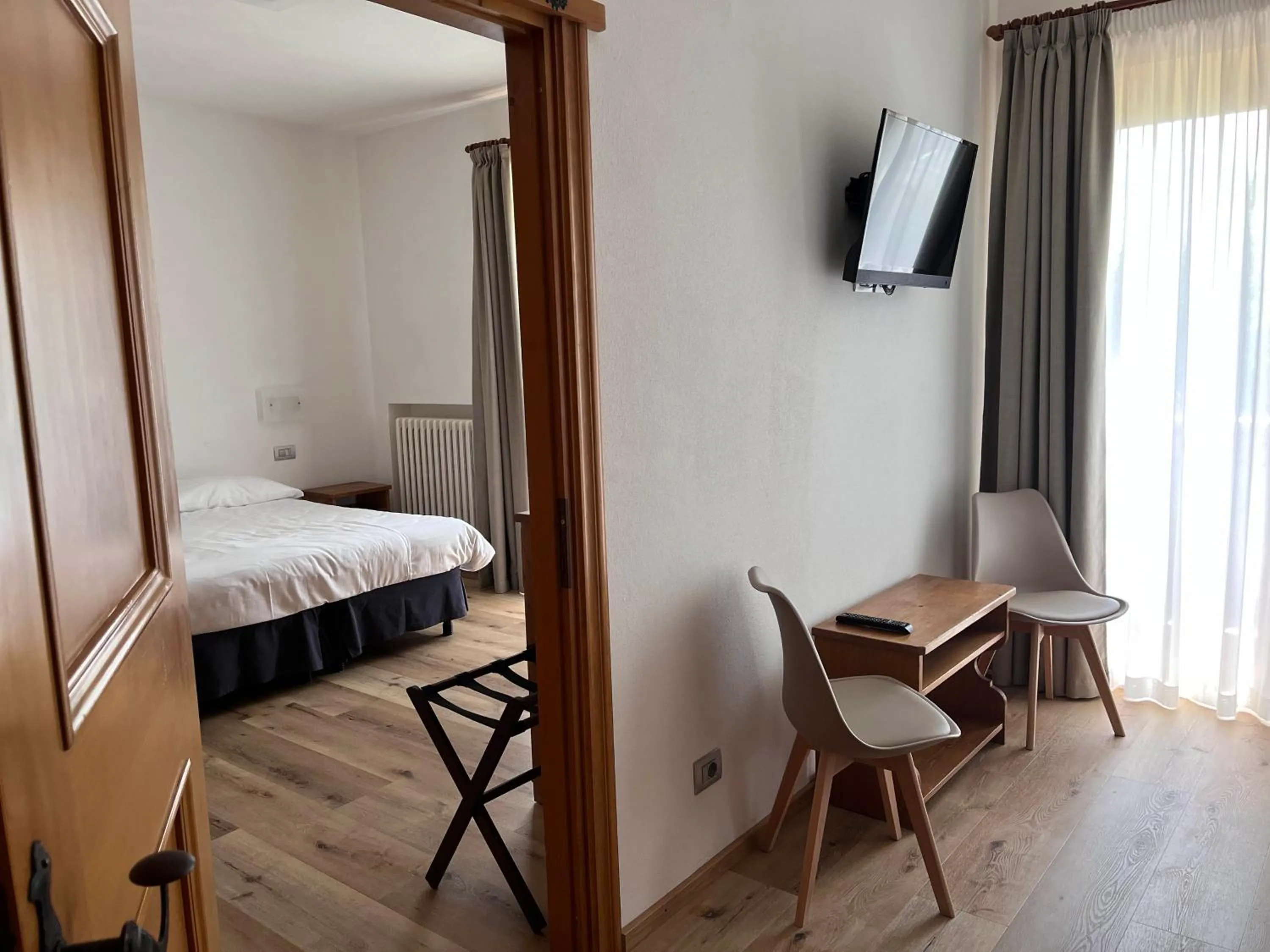 Bed in Hotel Albergo Dolomiti