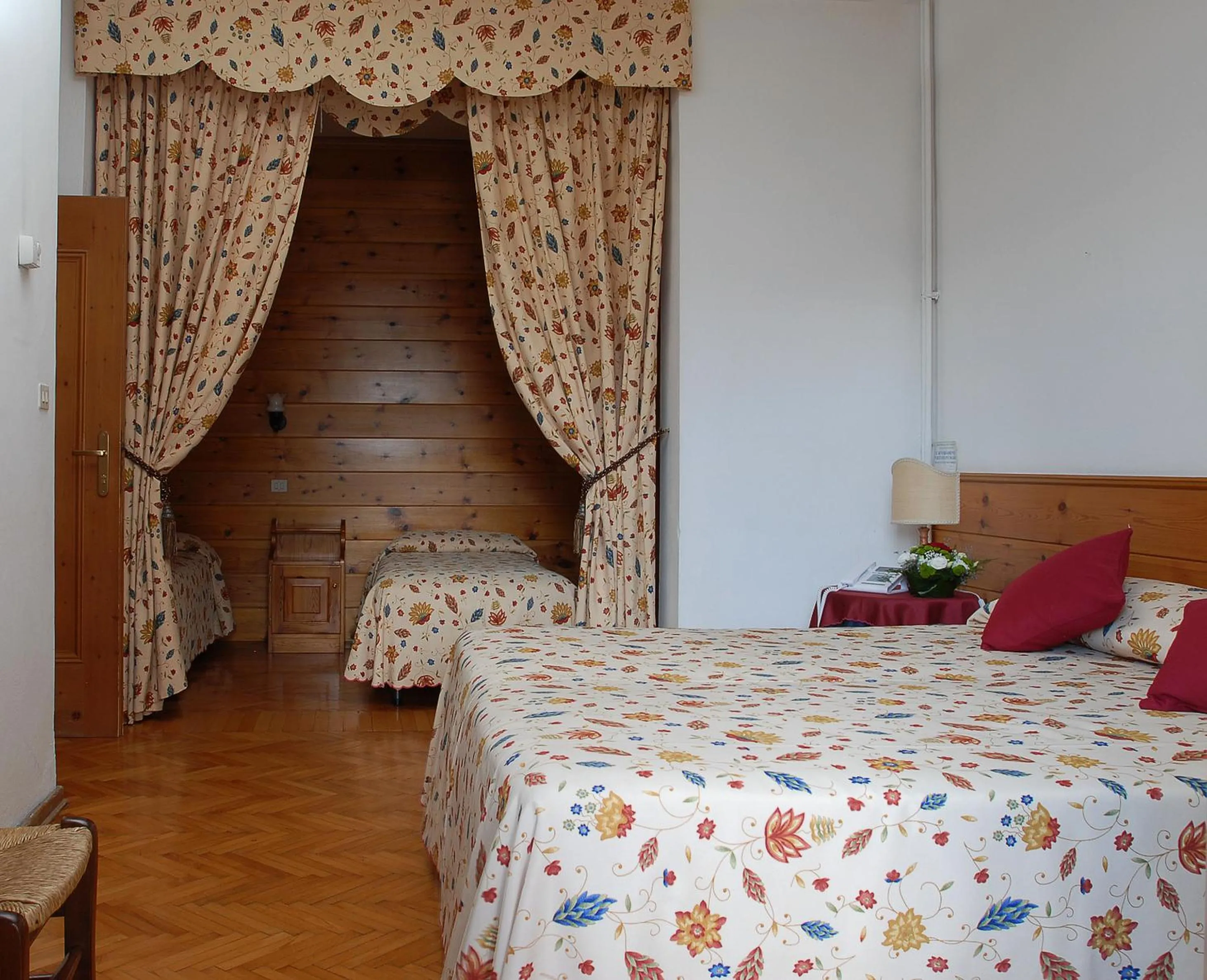 Bed in Hotel Albergo Dolomiti