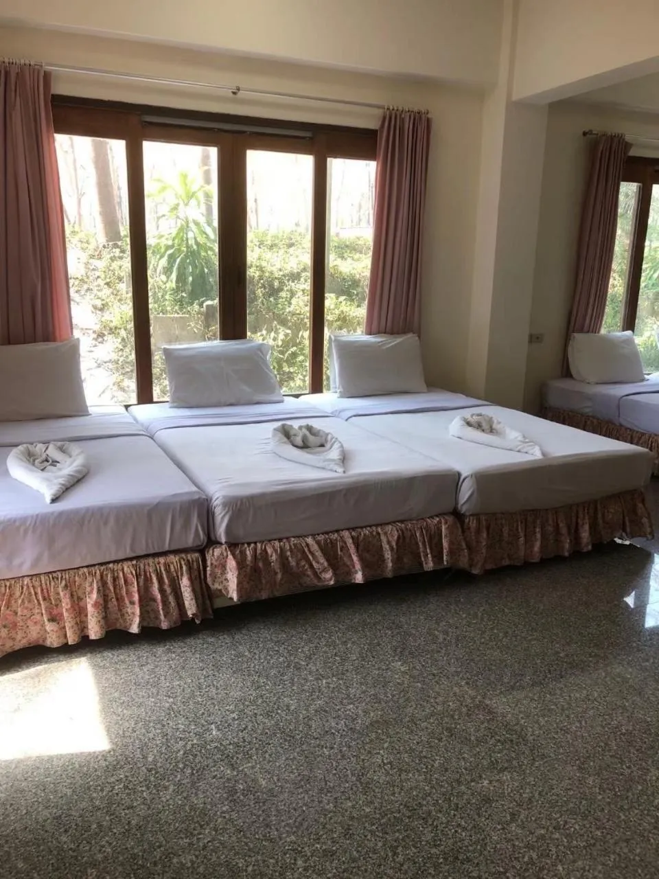 Bed in Tak Andaman Resort & Hotel