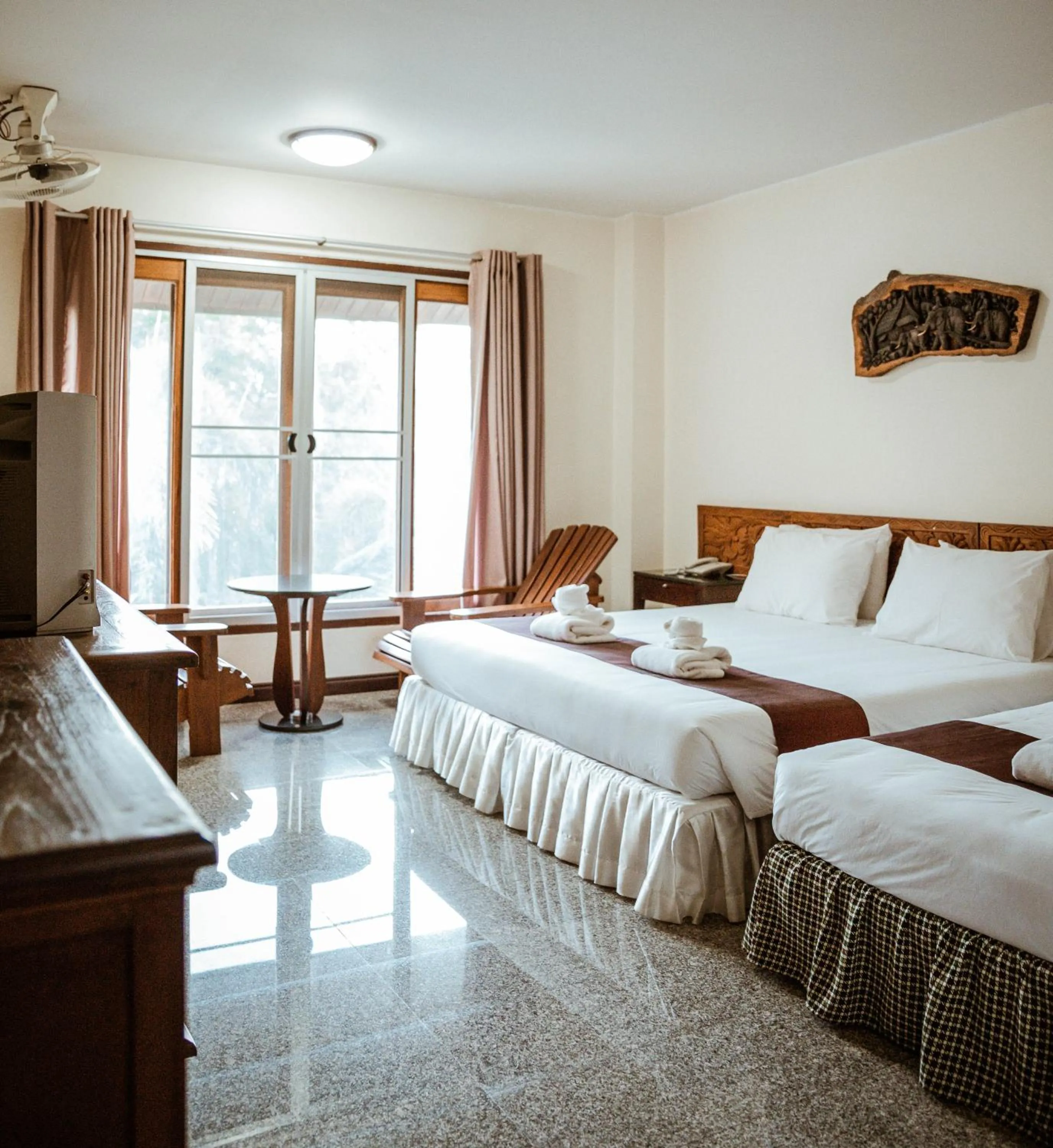 Bed in Tak Andaman Resort & Hotel