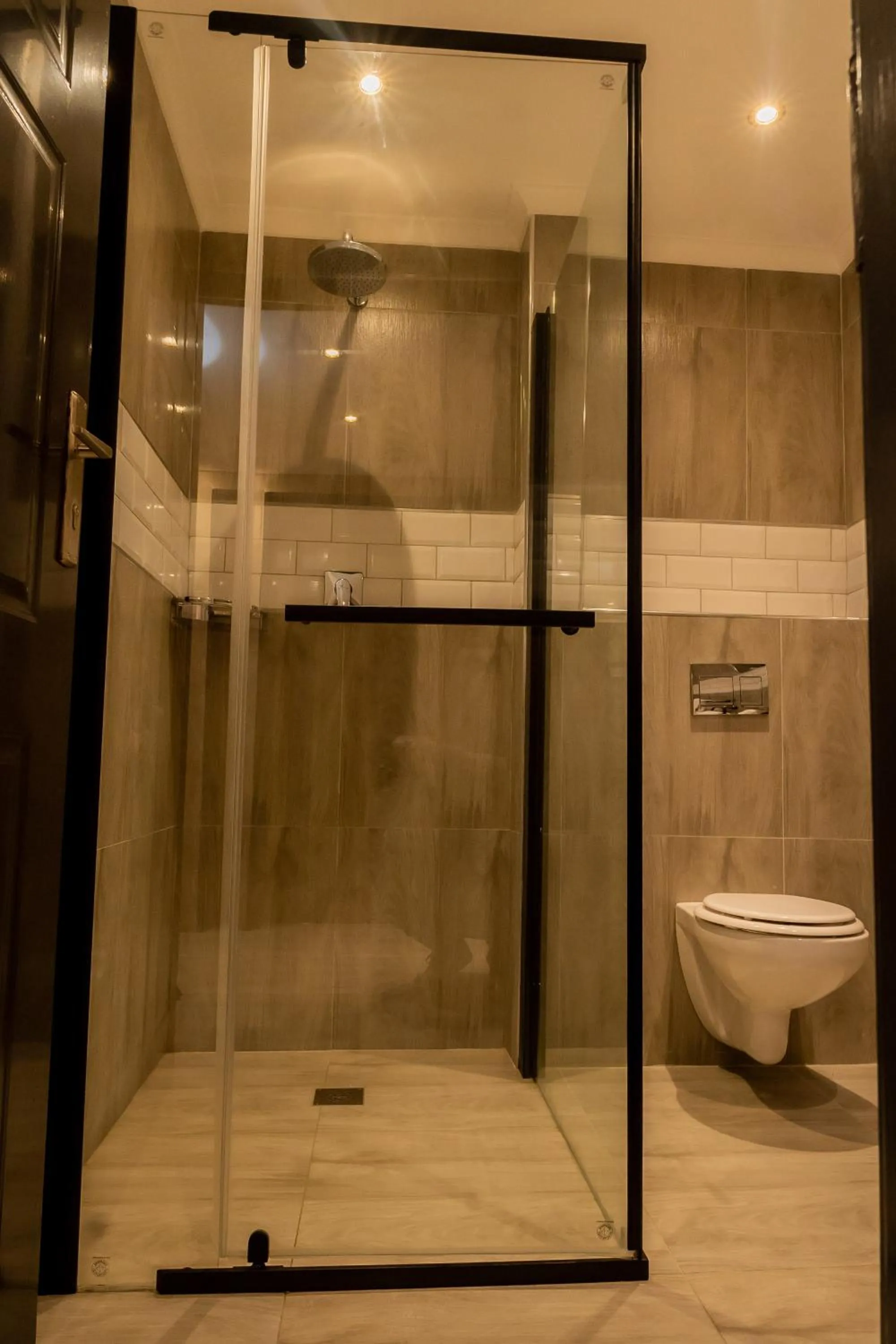 Shower in Casa Mia Lodge & Restaurant