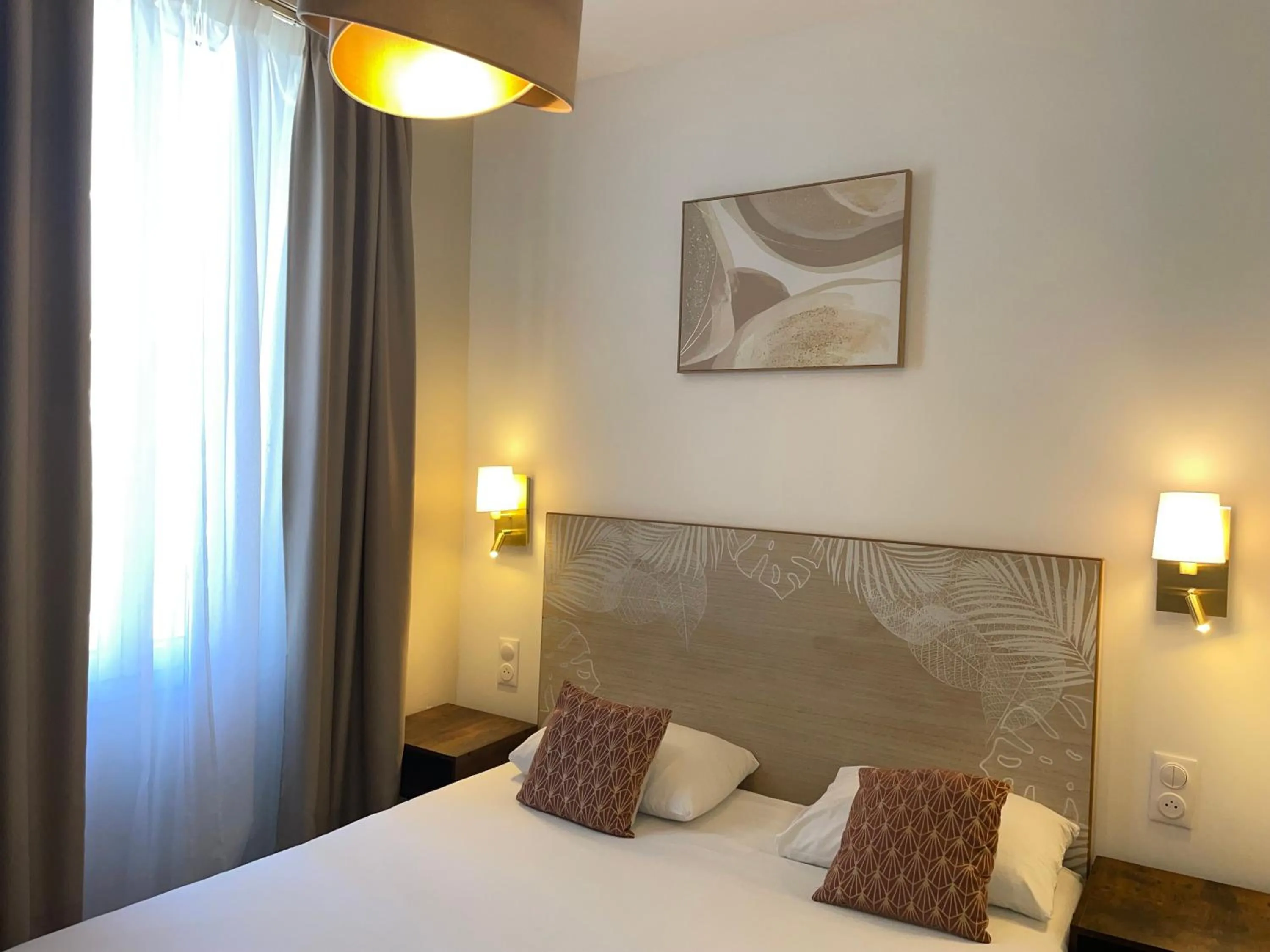 Bed in Hôtel P.L.M.