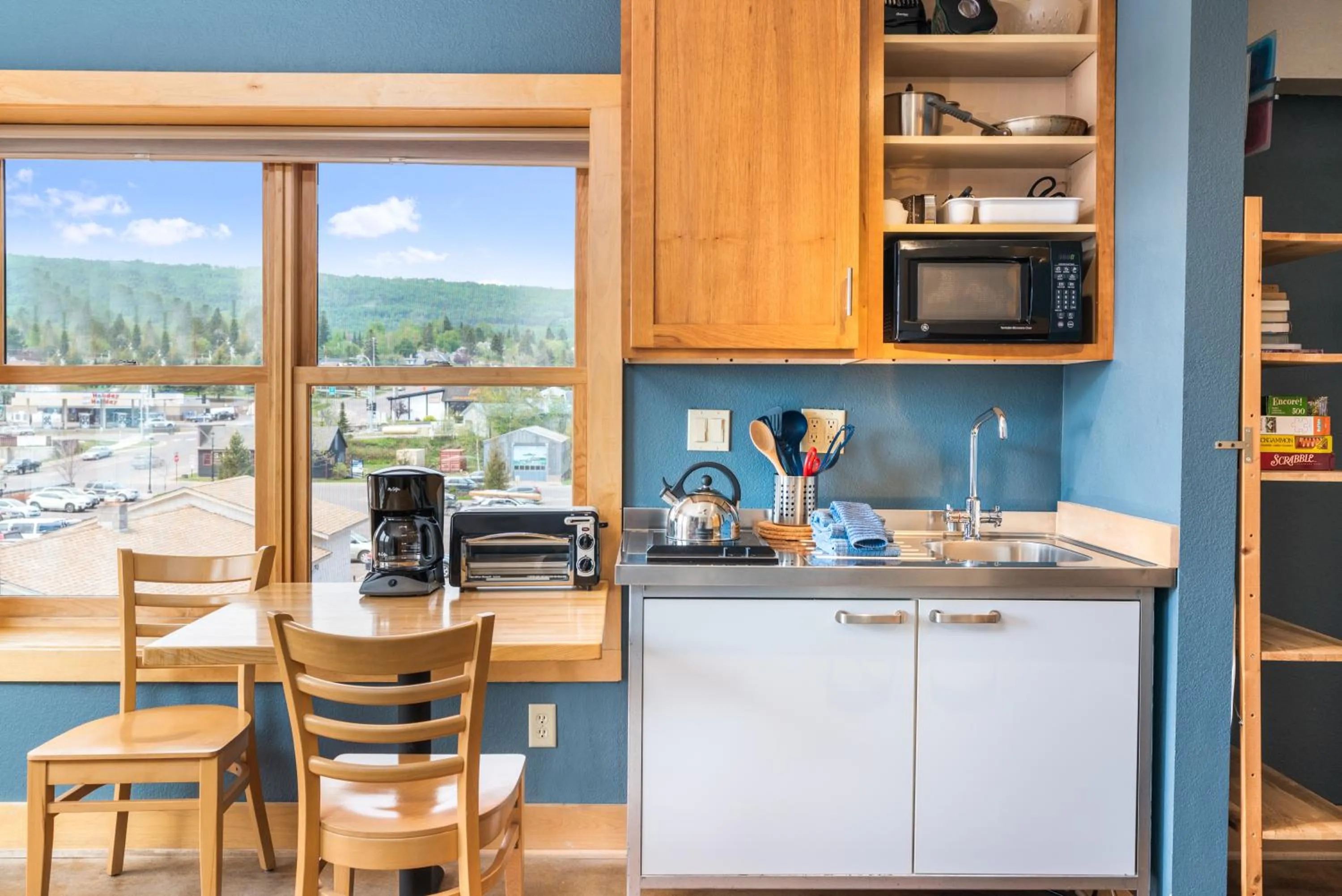 Kitchen or kitchenette in East Bay Suites
