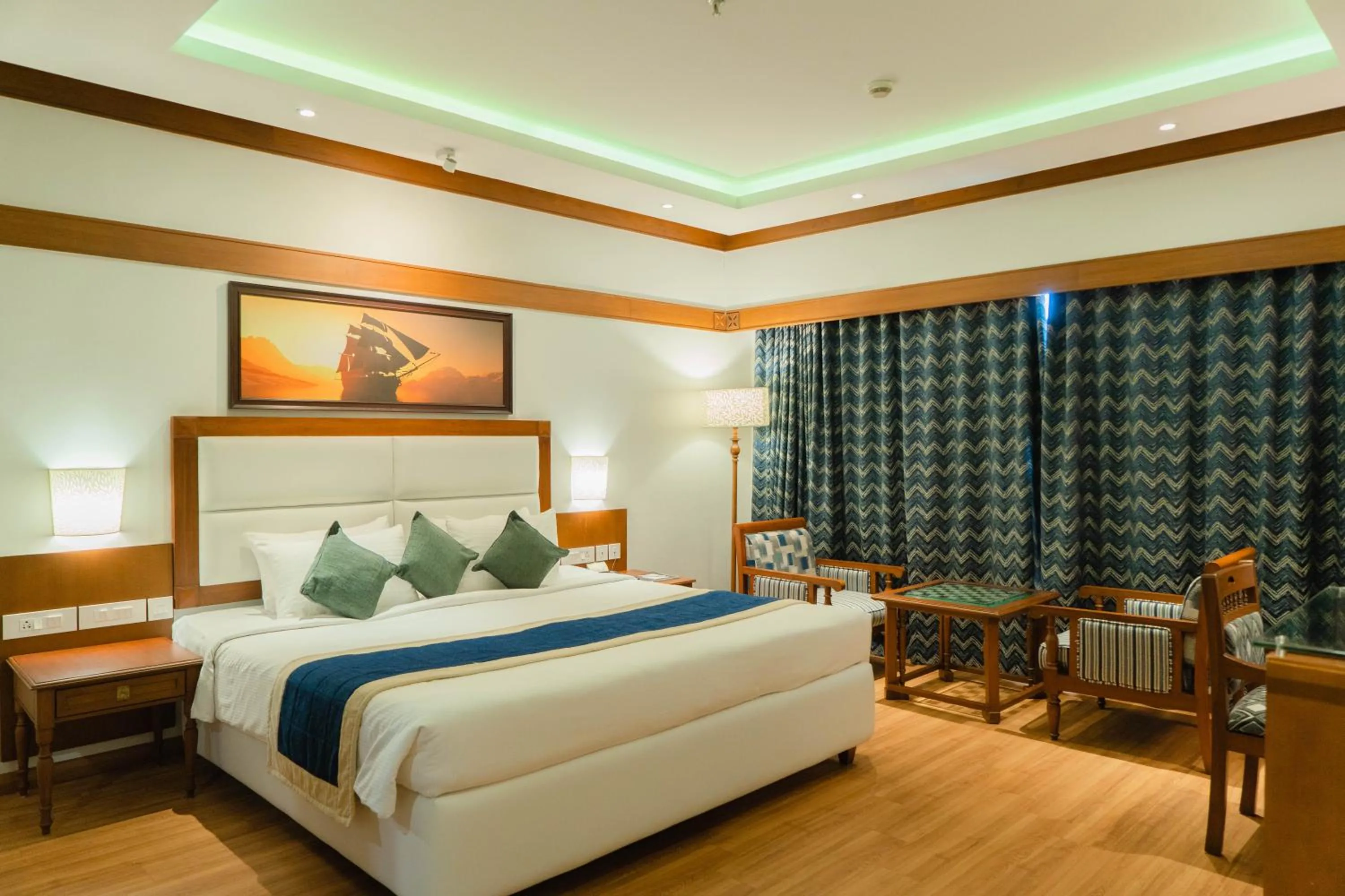 Bed in KTDC Mascot Hotel - A Heritage Living Experience