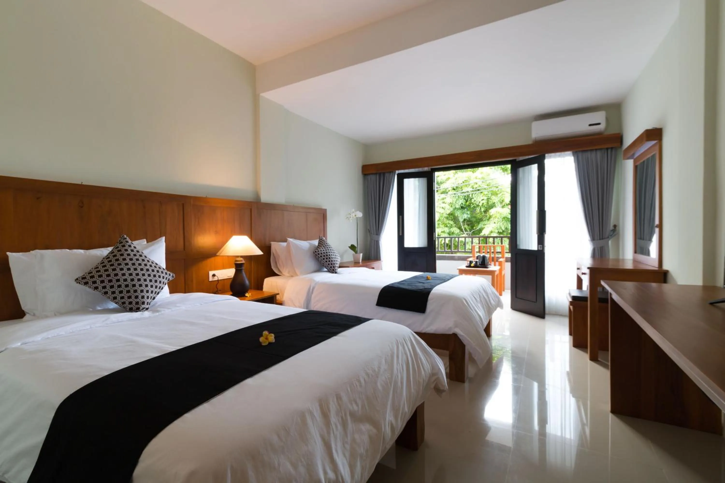 Photo of the whole room, Bed in AB Hotel Kuta by AGATA