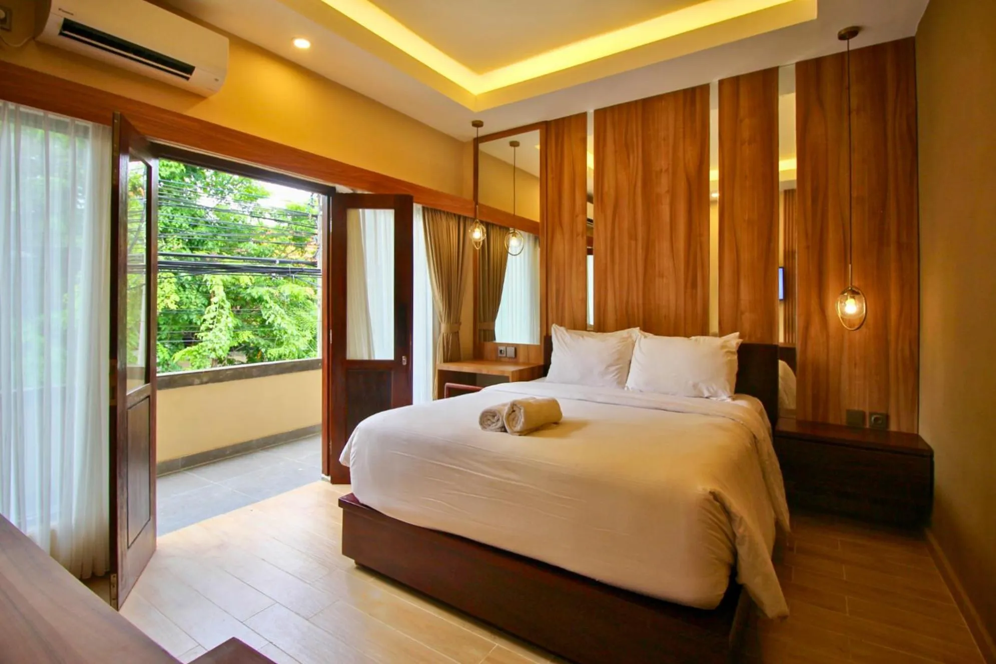 Bed in AB Hotel Kuta by AGATA