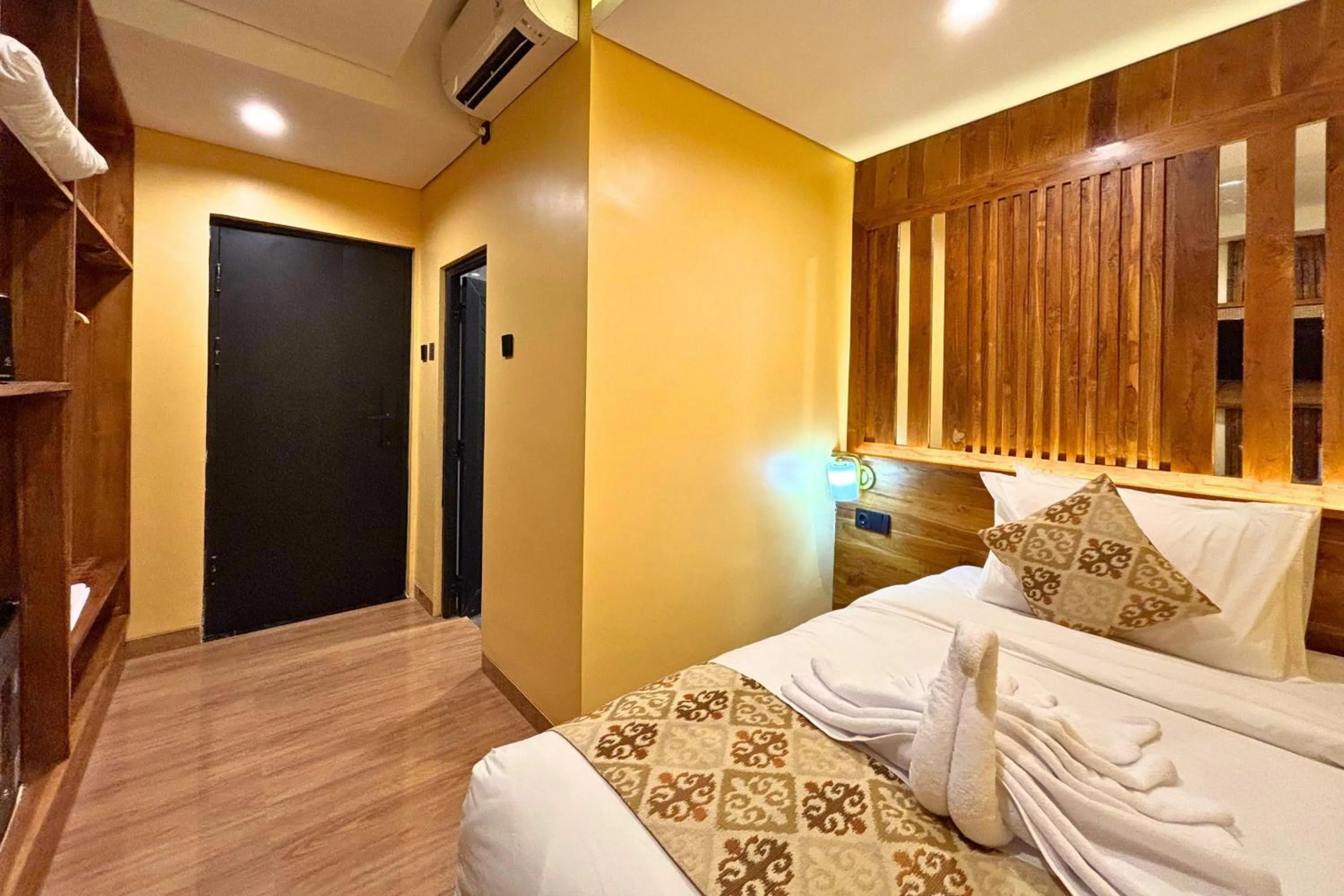 Bed in AB Hotel Kuta by AGATA