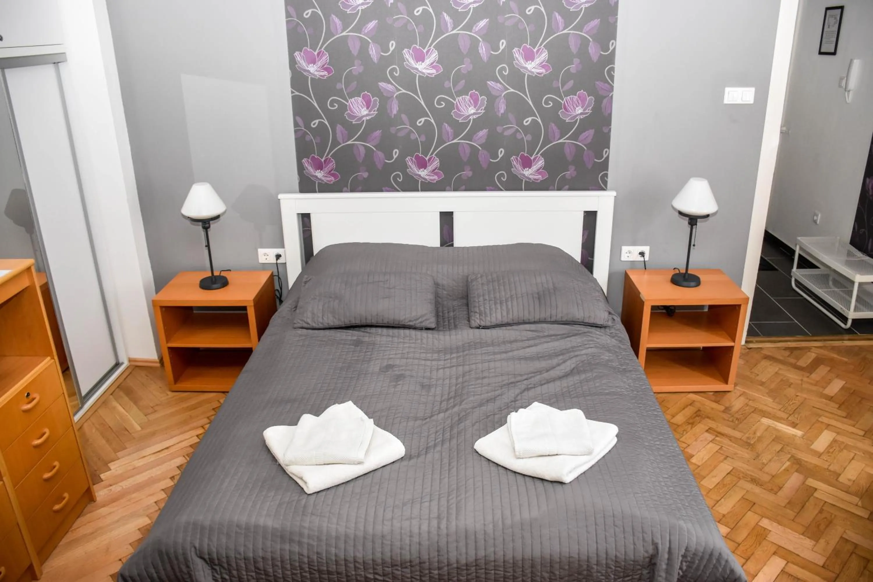 Bed in Diamond Astoria Apartments