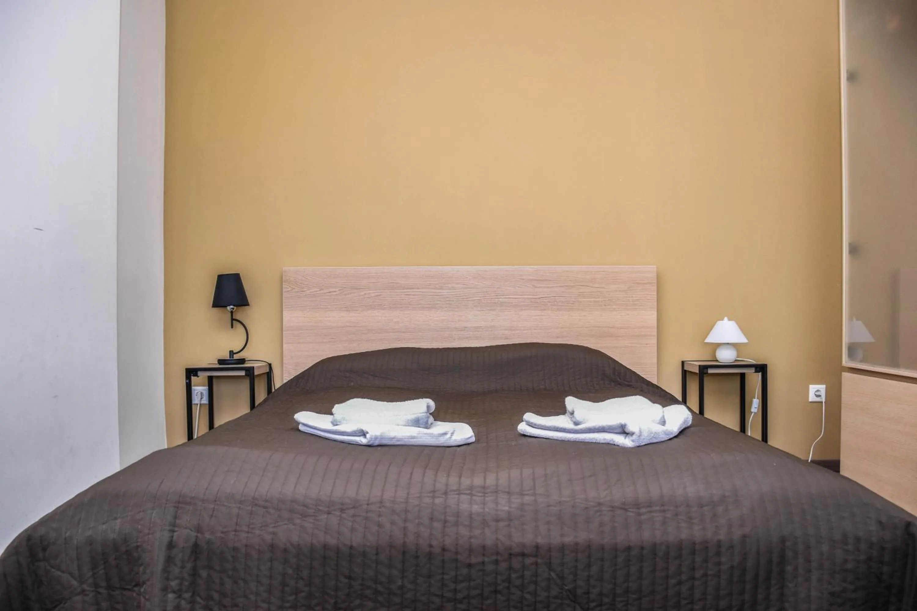 Bed in Diamond Astoria Apartments