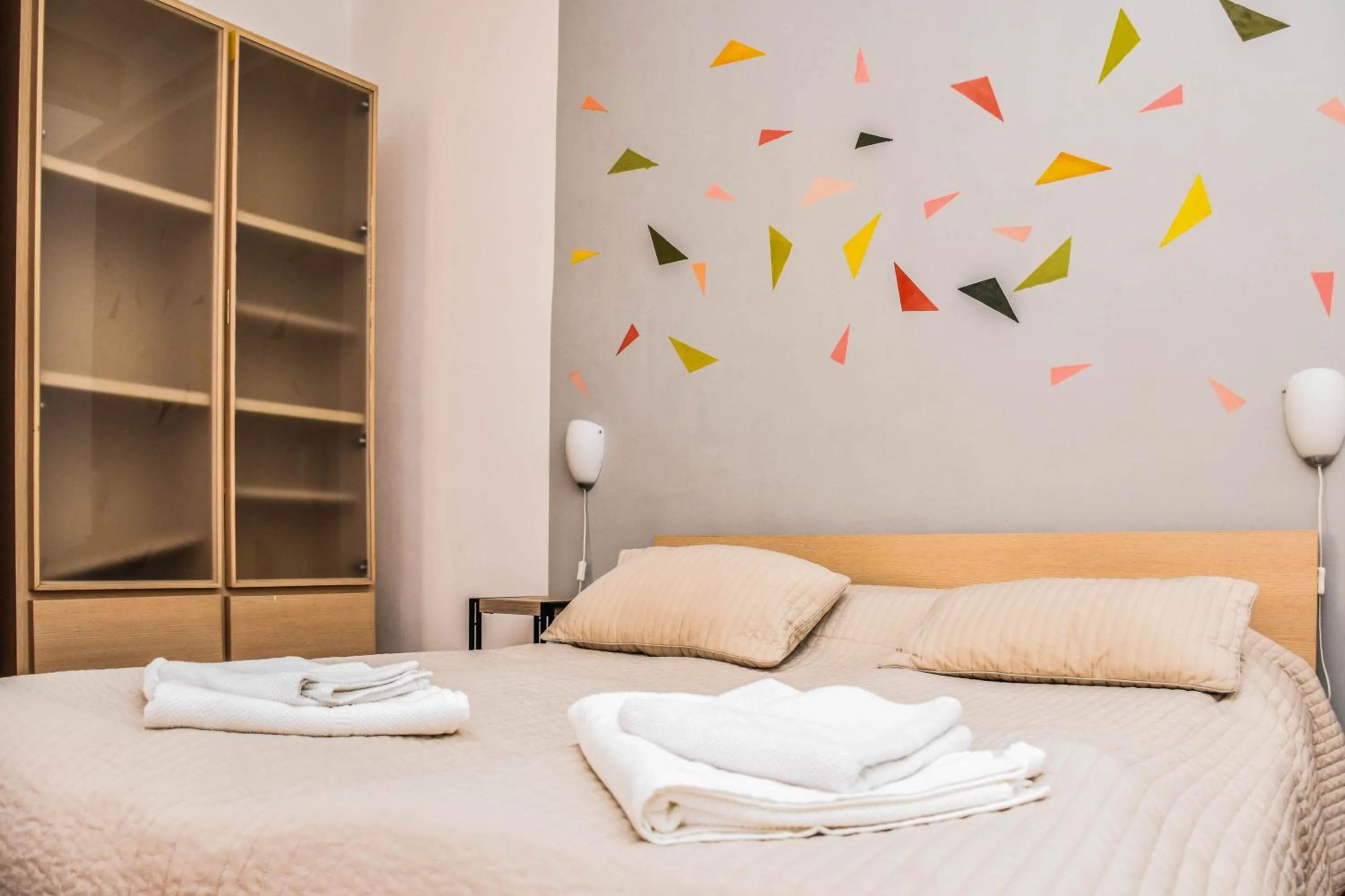 Bed in Diamond Astoria Apartments