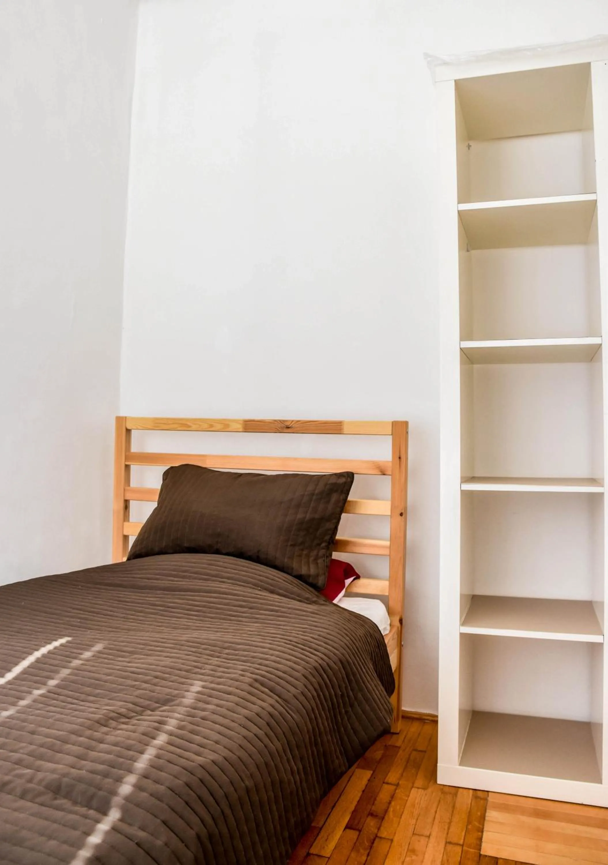 Bed in Diamond Astoria Apartments