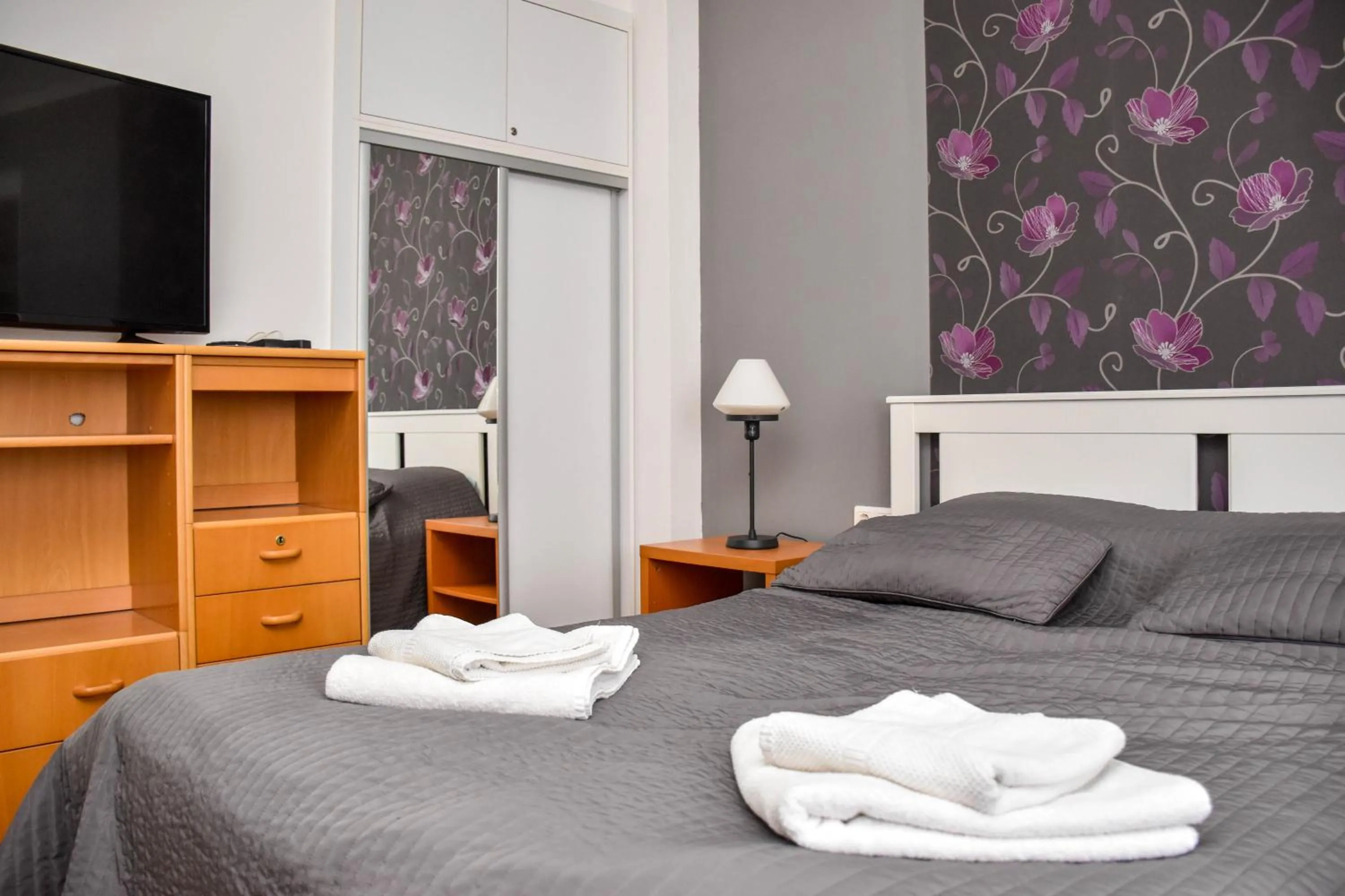 Bed in Diamond Astoria Apartments