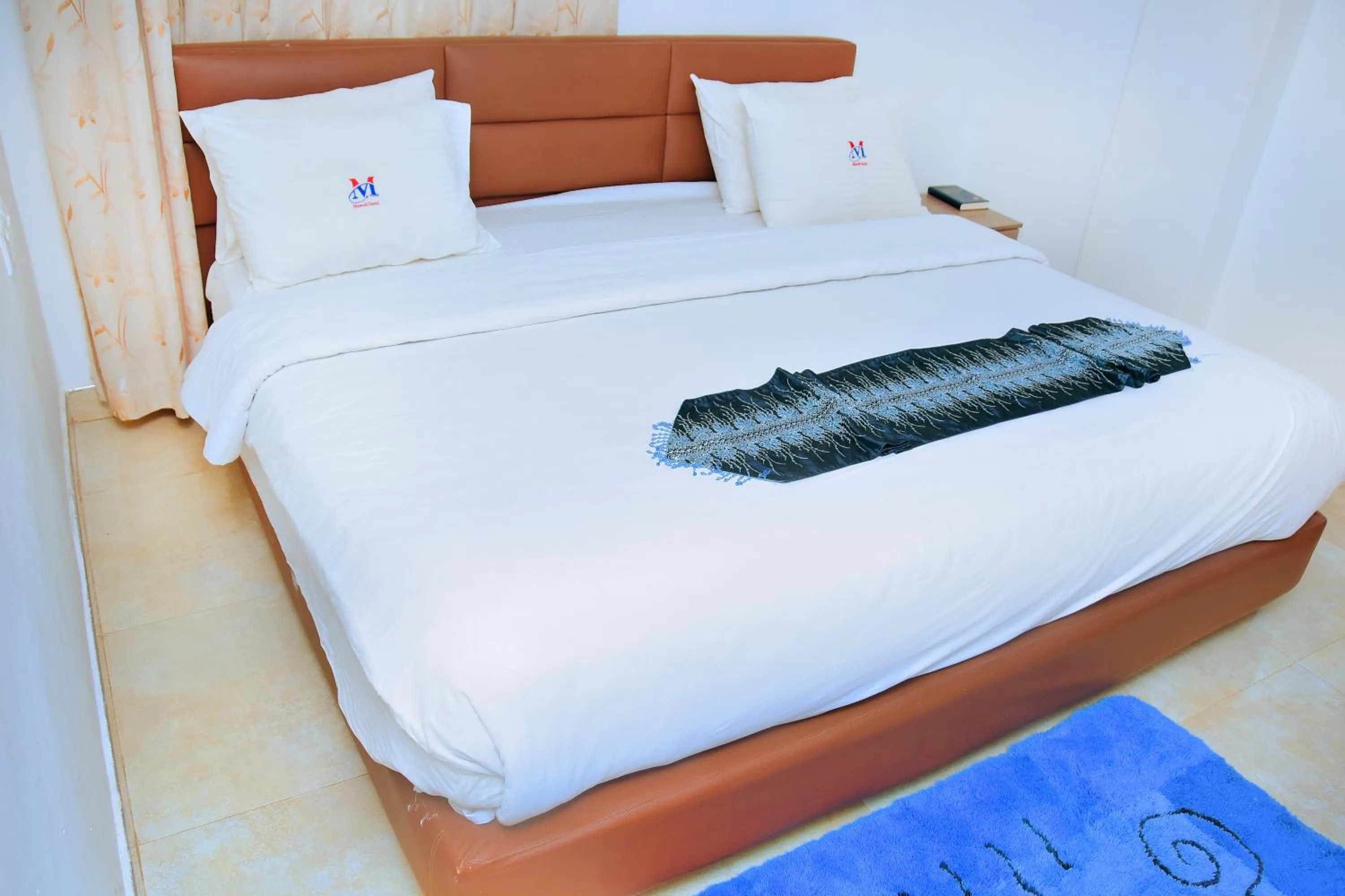 Bed in Mawuli Hotel