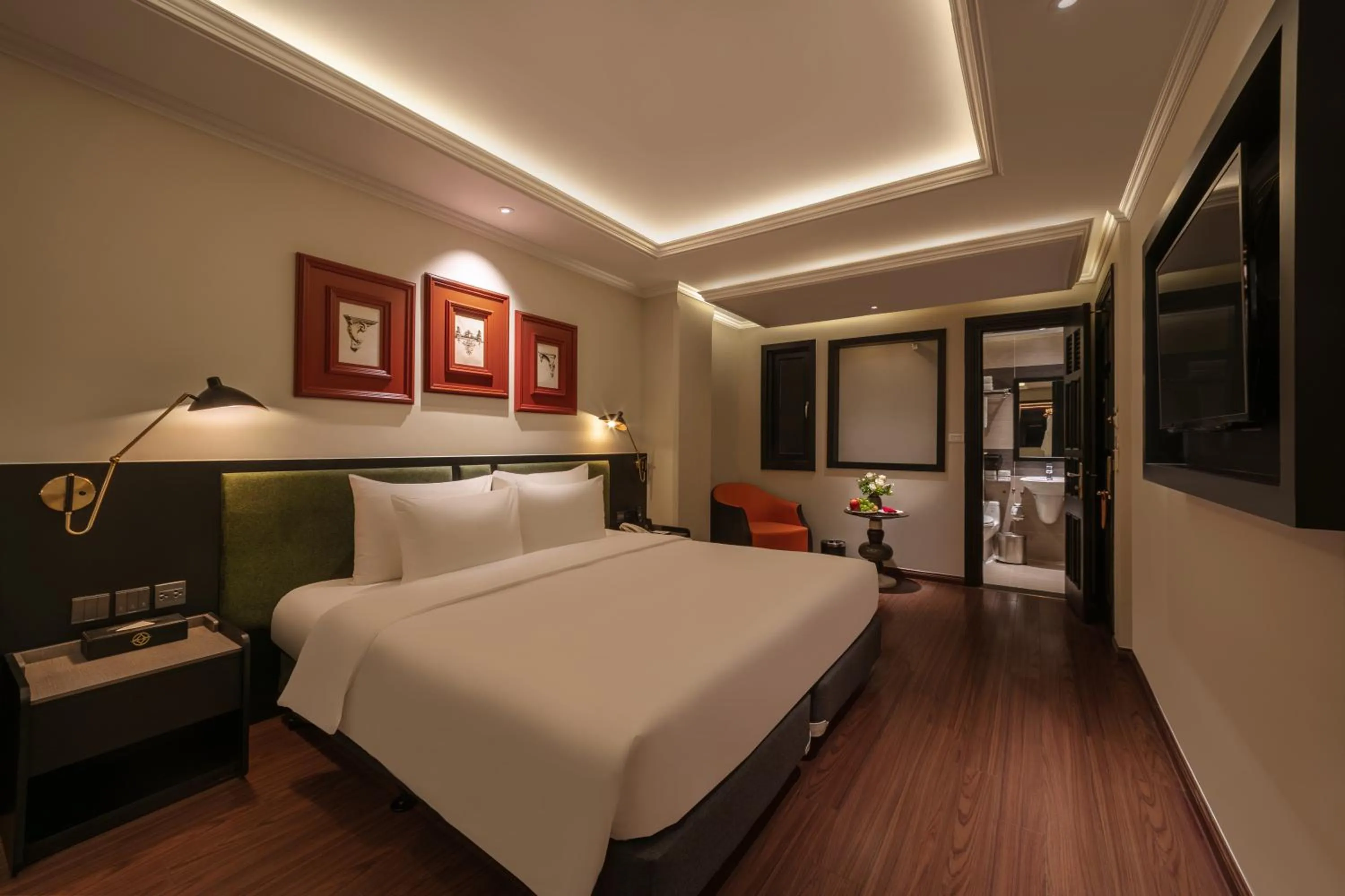 Seating area, Bed in Champton Hanoi Hotel