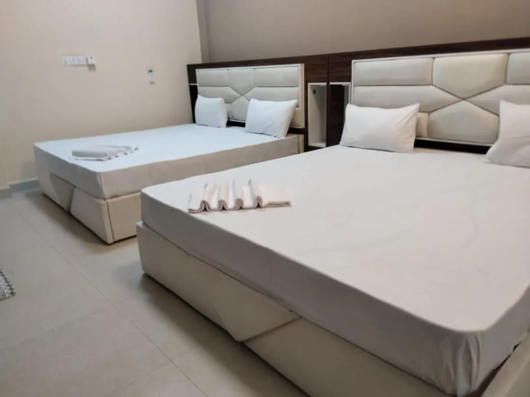 Bed in Gnaanams Hotel and Restaurant